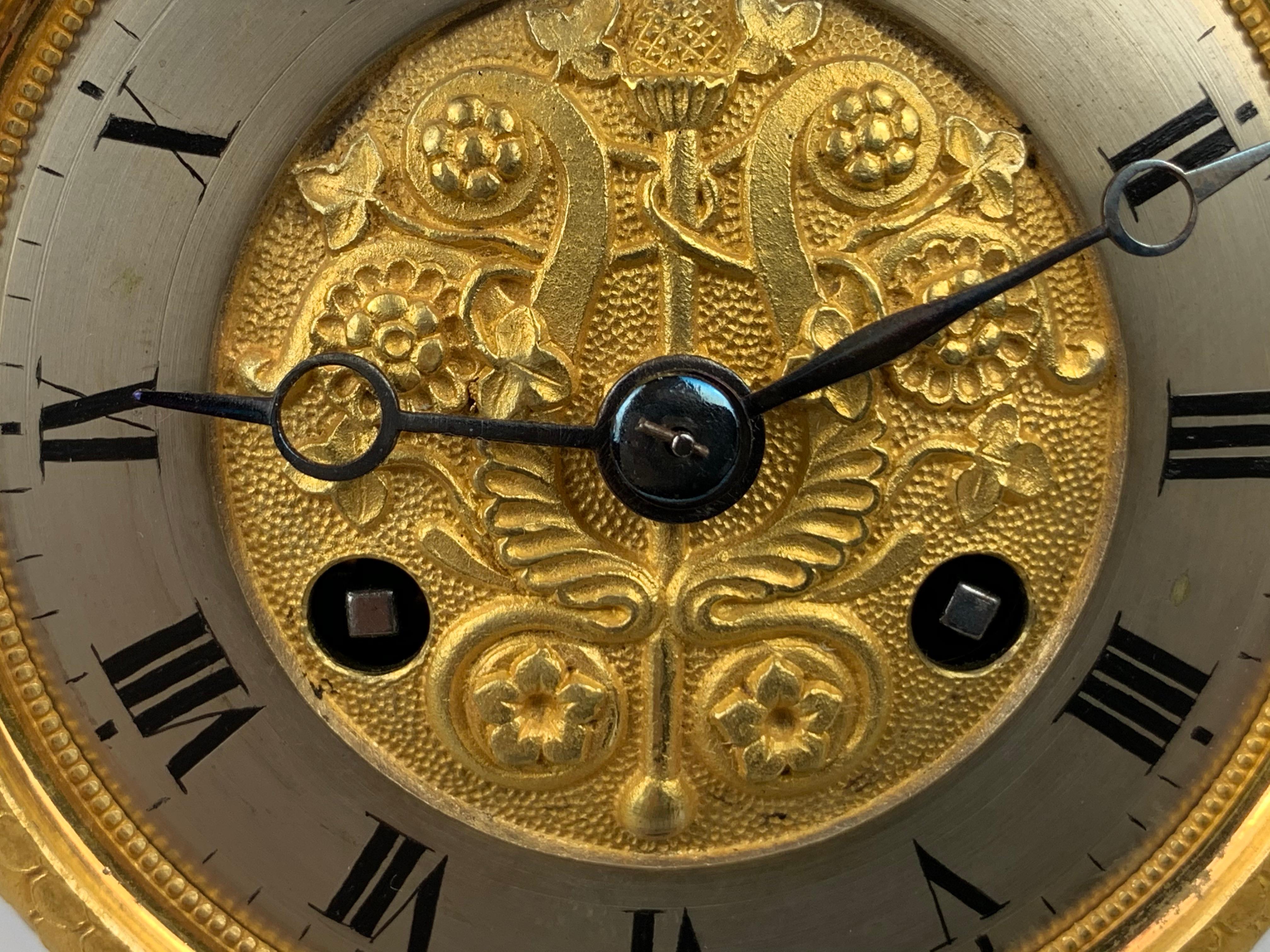 Französische Empire-Bronze-Doré und patinierte Uhr mit Atlasdarstellung im Angebot 9