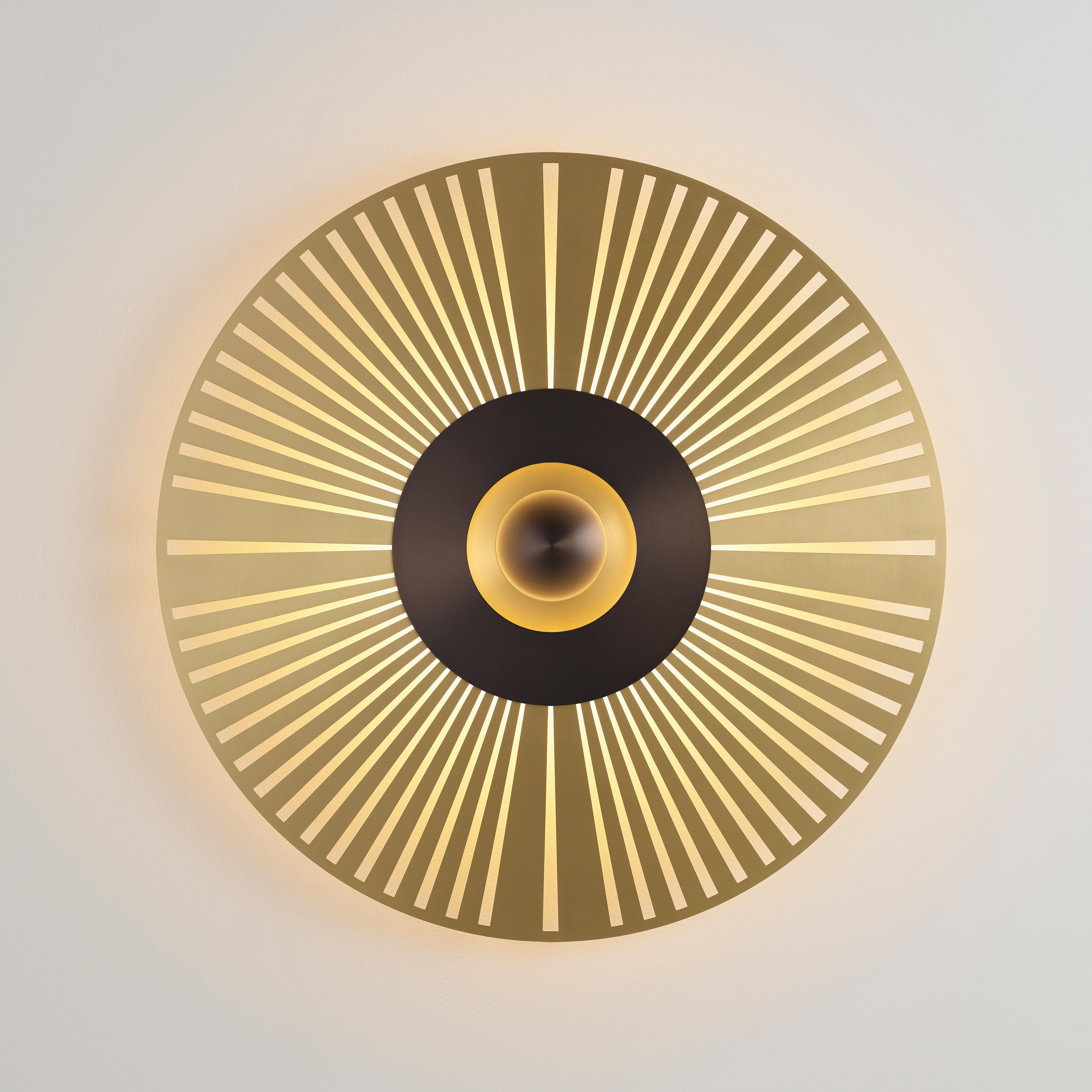 Atmos Eclat wall light by Emilie Cathelineau
Dimensions: D80 cm
Materials: Solid brass, Polycarbonate diffuser.
Others finishes and dimensions are available.

All our lamps can be wired according to each country. If sold to the USA it will be