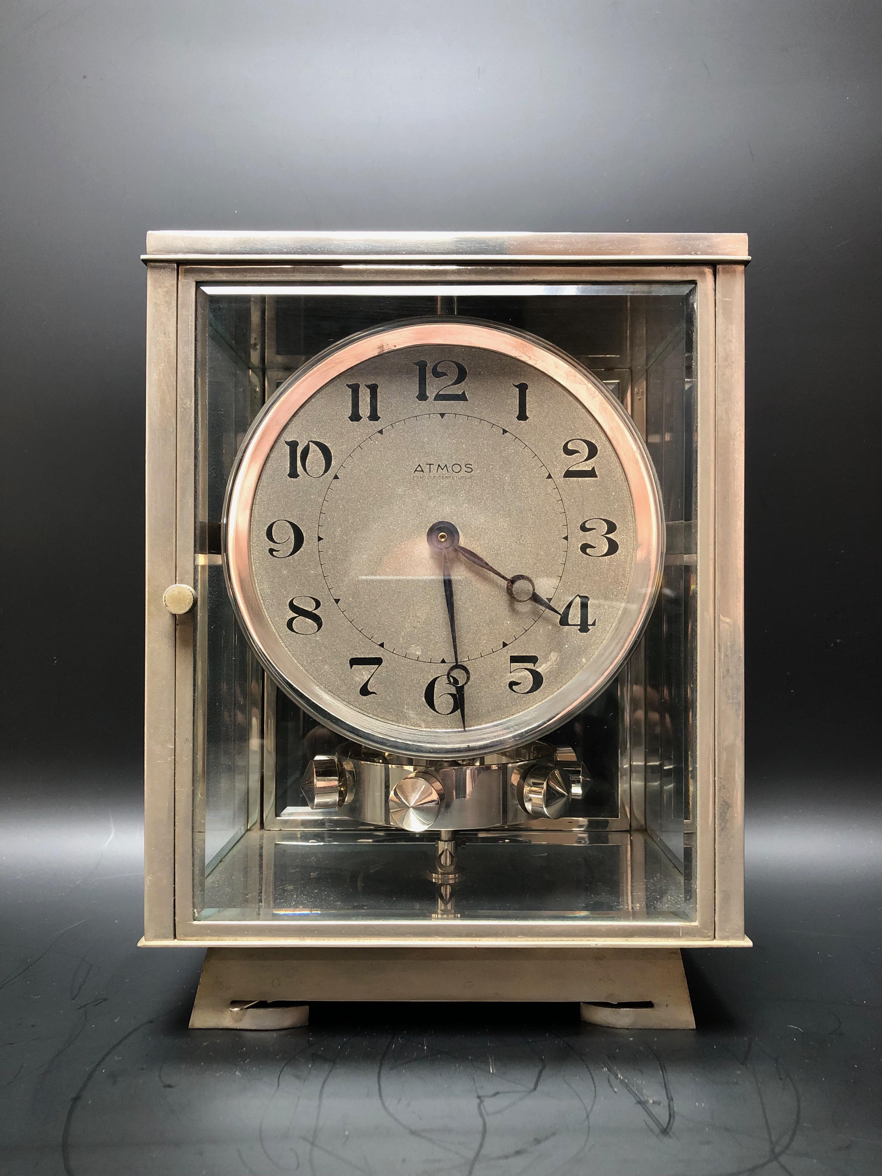 Atmos art deco clock circa 1930 stamped JL Reutter N. 
System invented by J.L. Reutter and produced by himself before reselling the patent to Jaeger le Coultre.
  Pendulum in very good condition, unserviced, in working order.

Width: 17.5cm
Height: