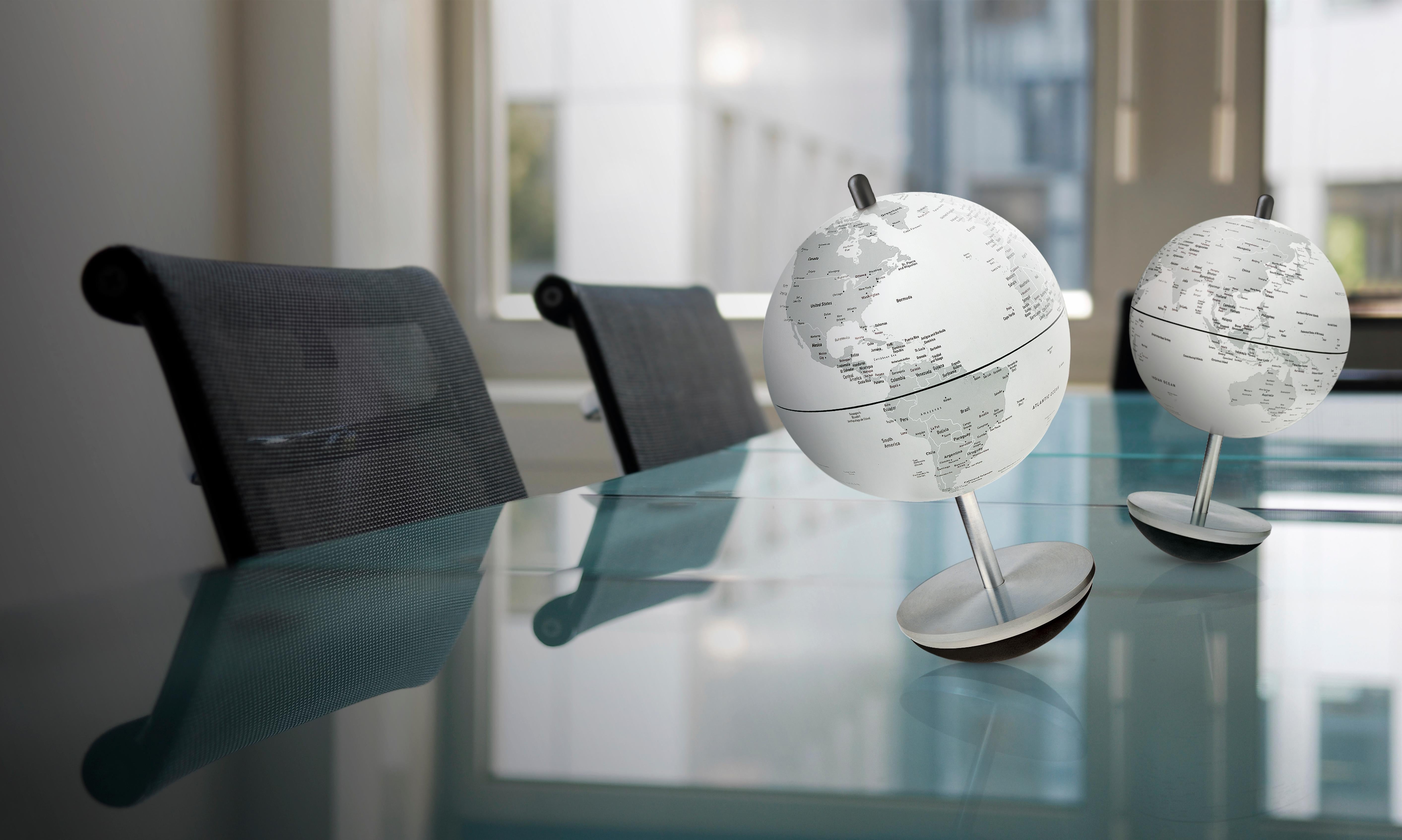 Atmosphere's Swing Globes are far from the traditional globes found in history class. Made from aluminum with a rubber self-righting base, this Globe has been specially fabricated to really get into the swing of things. Its chic white gray color