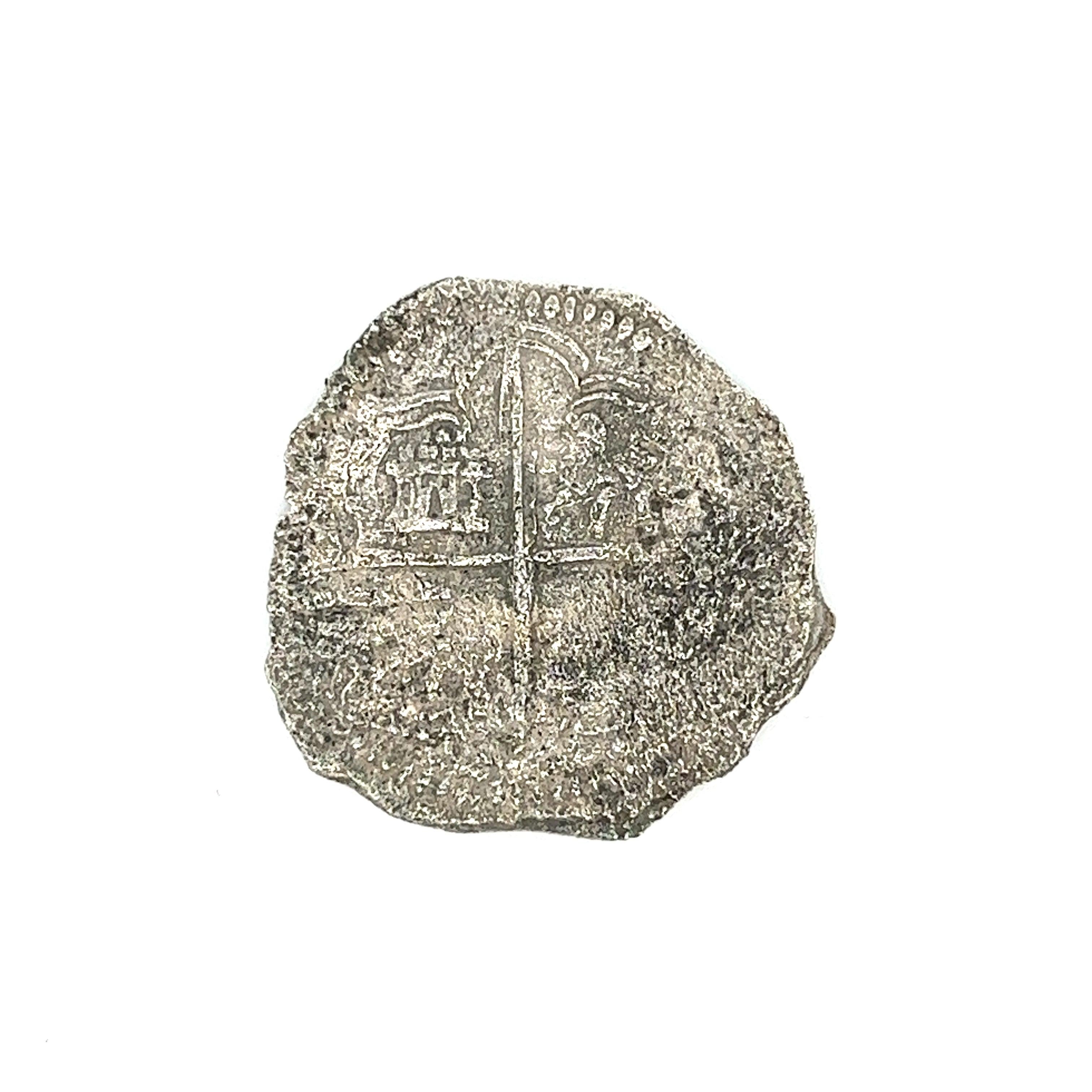 Original Atocha Shipwreck Coin 4 Reale Grade 3 Potosi Mint 

Le nom Potosi Mint signifie que la pièce a été frappée dans le nord du Pérou, dans l'actuelle Bolivie. 

La dénomination 4 Reale devient de plus en plus rare : la plupart des pièces à bord