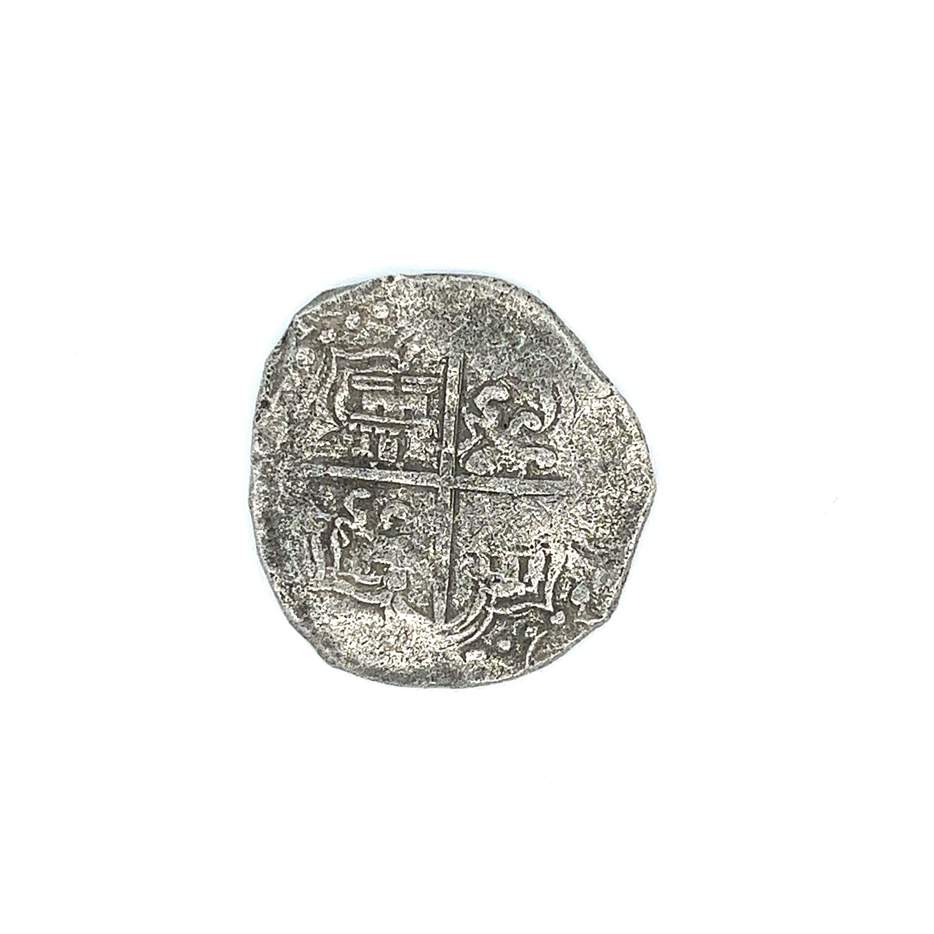 Original Atocha Shipwreck Silbermünze 8 Reale Potosi Prägegrad 3 unmontiert. Komplett mit dem Original der Treasure Salvors Inc. und der Unterschrift von Mel Fisher. 

Grad 2-3 bedeutet, dass die Münze aus der Mitte des Trümmerfeldes geborgen wurde