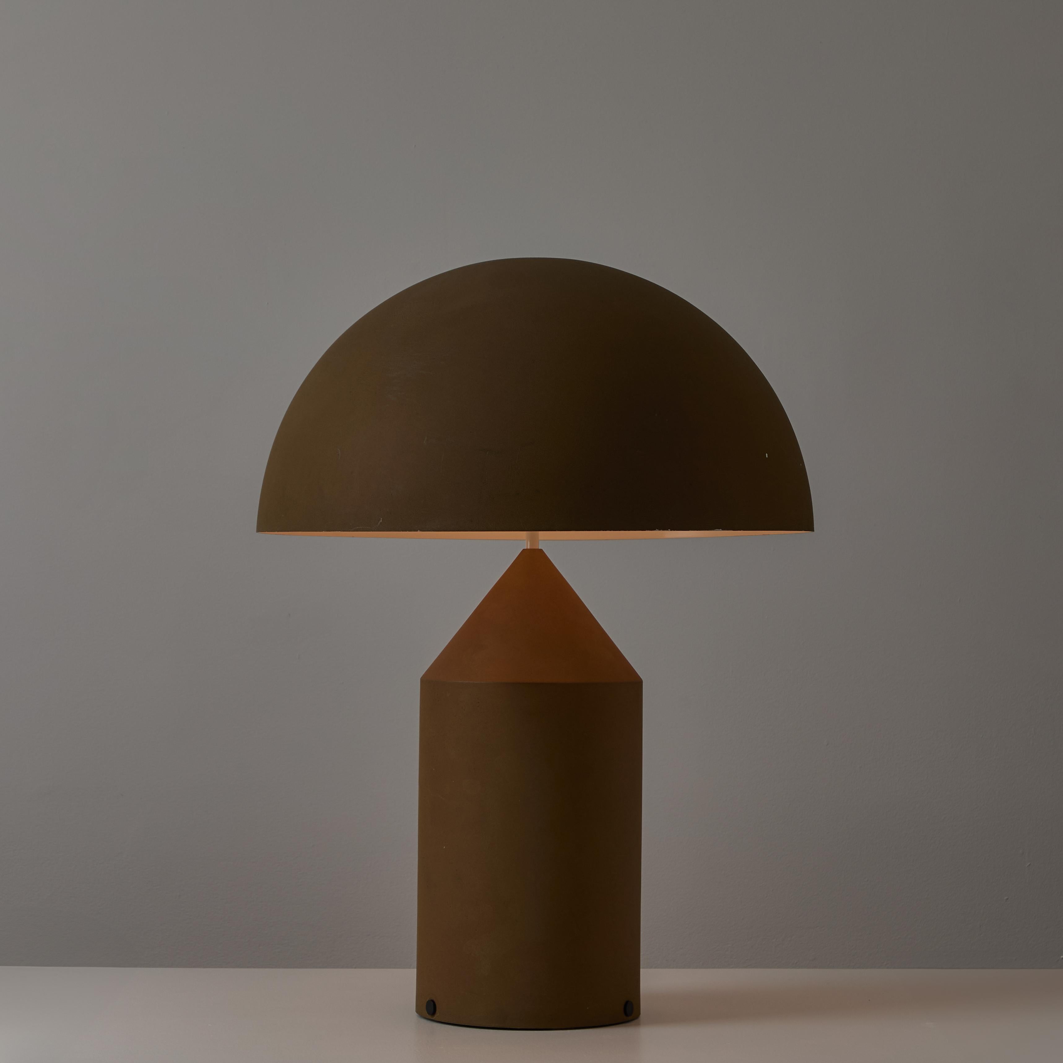 Atollo lamp by Vico Magistretti for Oluce, circa 1977. Designed by Magistretti in 1977, it was awarded the Compasso d'Oro in 1979. Early production with original textured matte enamel finish. Original one-of-a-kind lever switch. Wired for the US. We