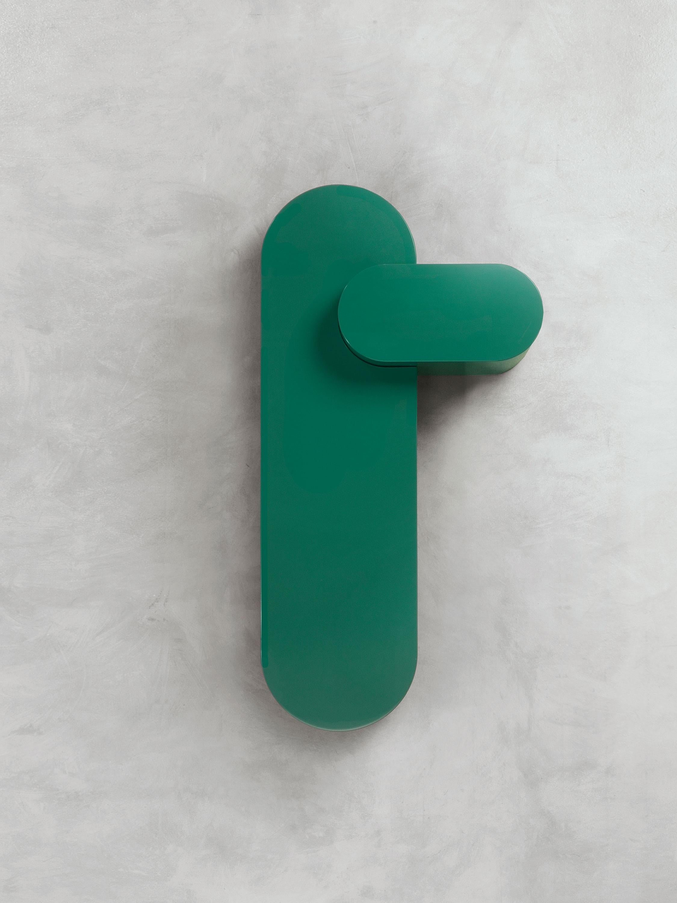 The colors and shapes of these coffee tables hark back to the sea and its islands. Like atolls, they can exist
either autonomously or interlock in functional, delightful combinations.
Lightened mdf monolithic structure. Patina green high gloss