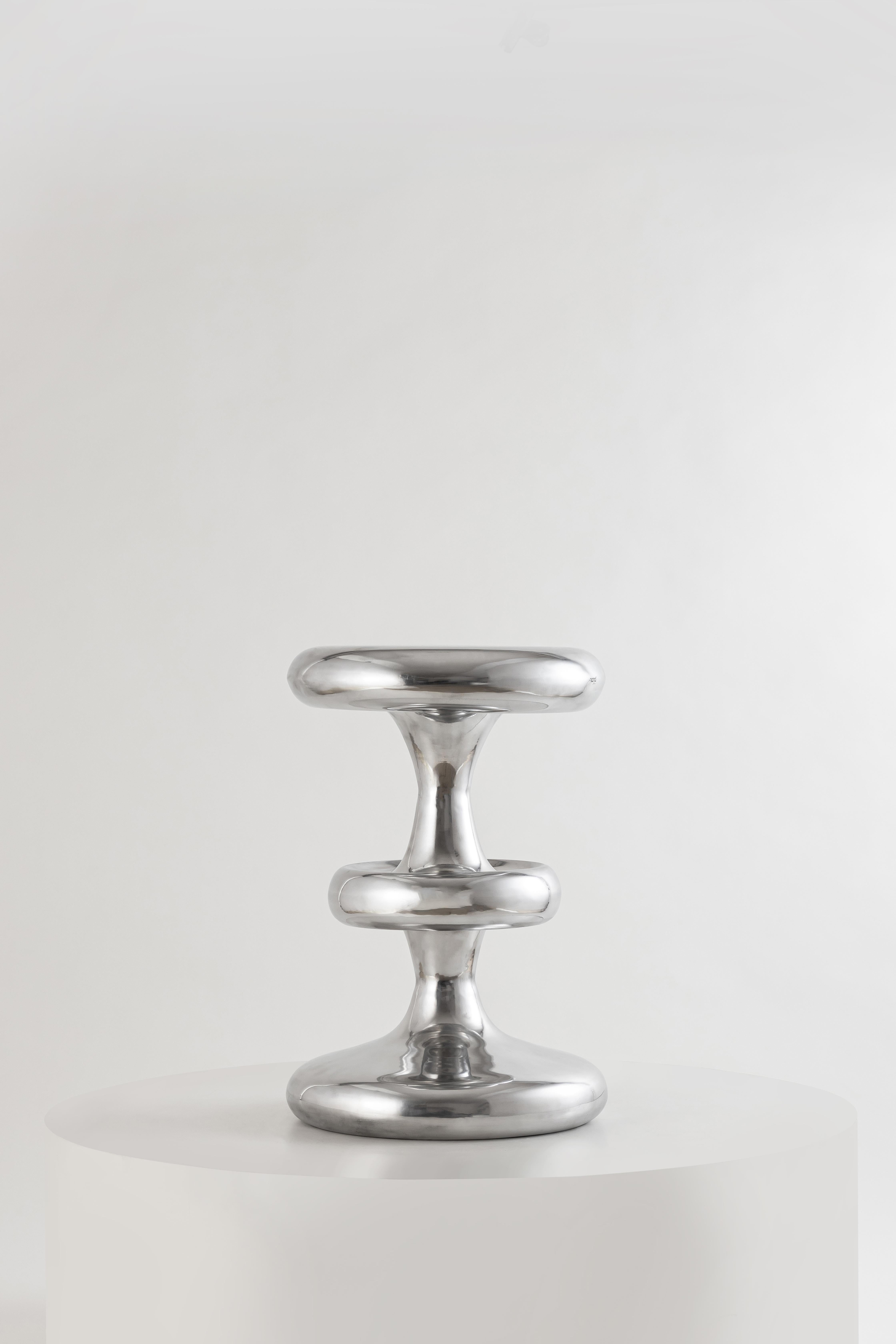 We dropped the Atom side table to show that a few bombs do spread beauty and smiles! This distinct side table, which has all the right curves in the right places, is here to add weight to your space and explode it with glamour.

Why do we call it