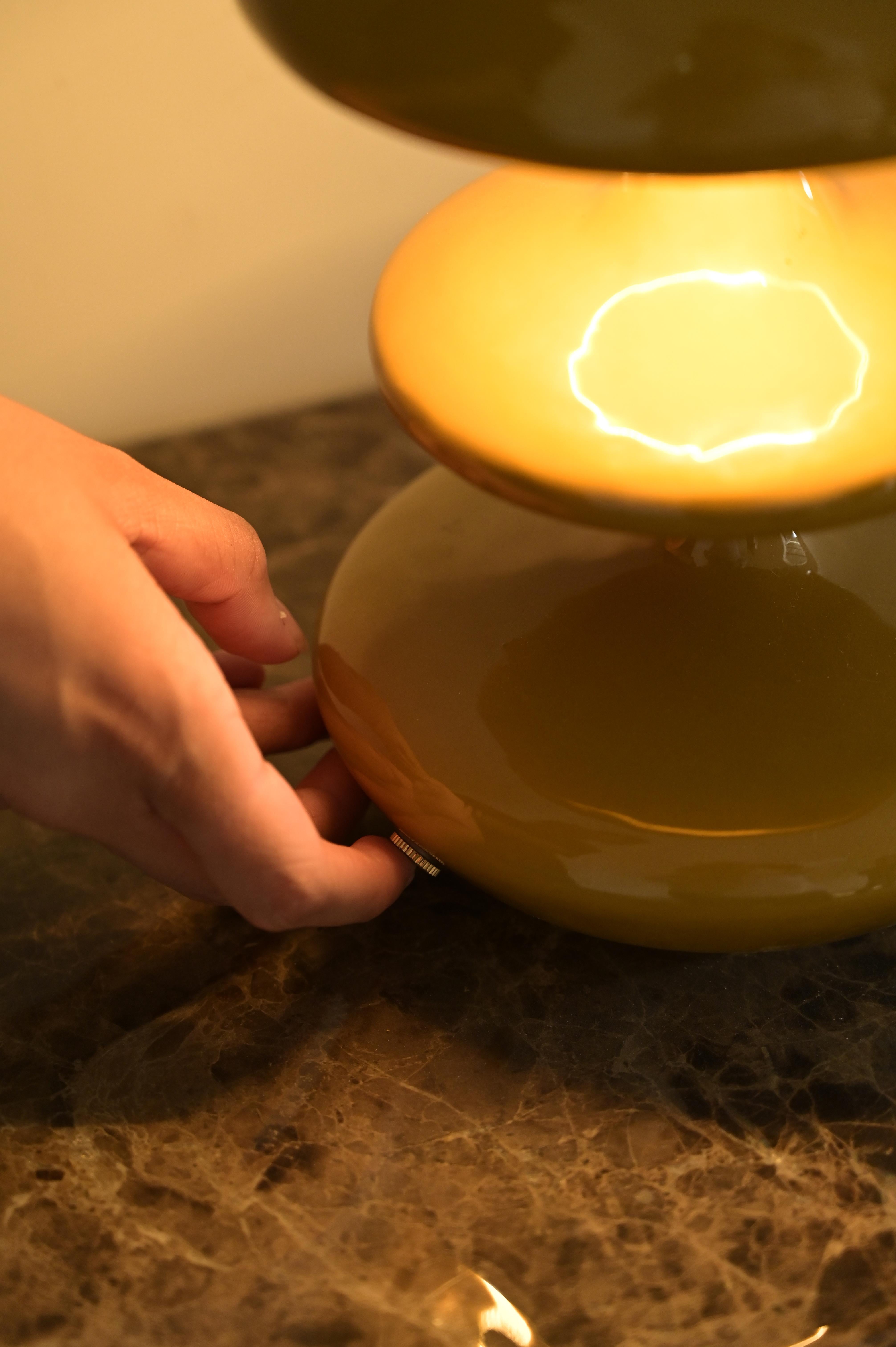 Introducing the Atom Table Lamp – inspired by the cloud that forms after an atom explosion, this lamp's silhouette exudes a bold yet refined blend of sophistication and charm

Crafted from premium materials and available in five versatile colors,