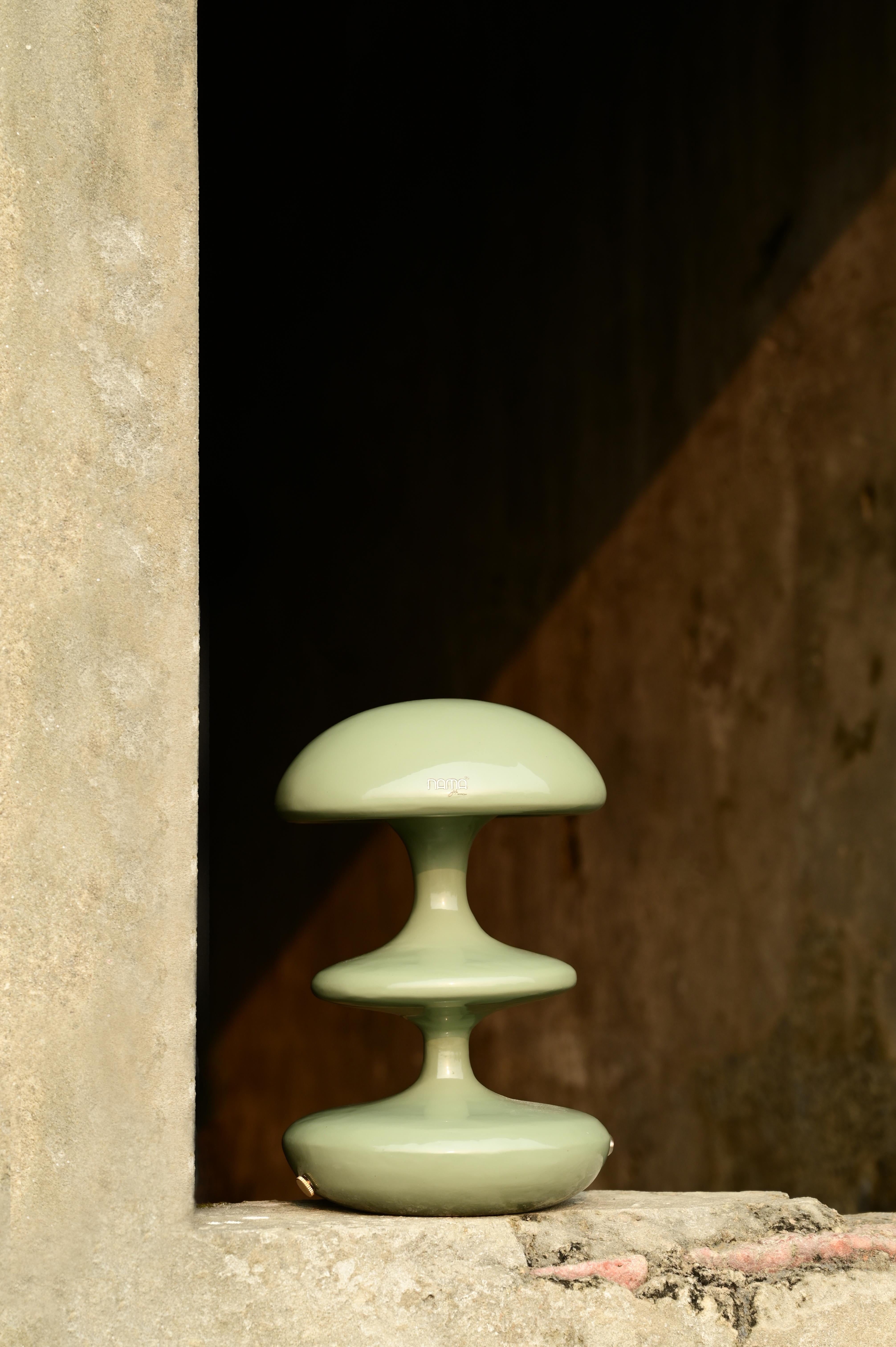 Introducing the Atom Table Lamp – inspired by the cloud that forms after an atom explosion, this lamp's silhouette exudes a bold yet refined blend of sophistication and charm

Crafted from premium materials and available in five versatile colors,