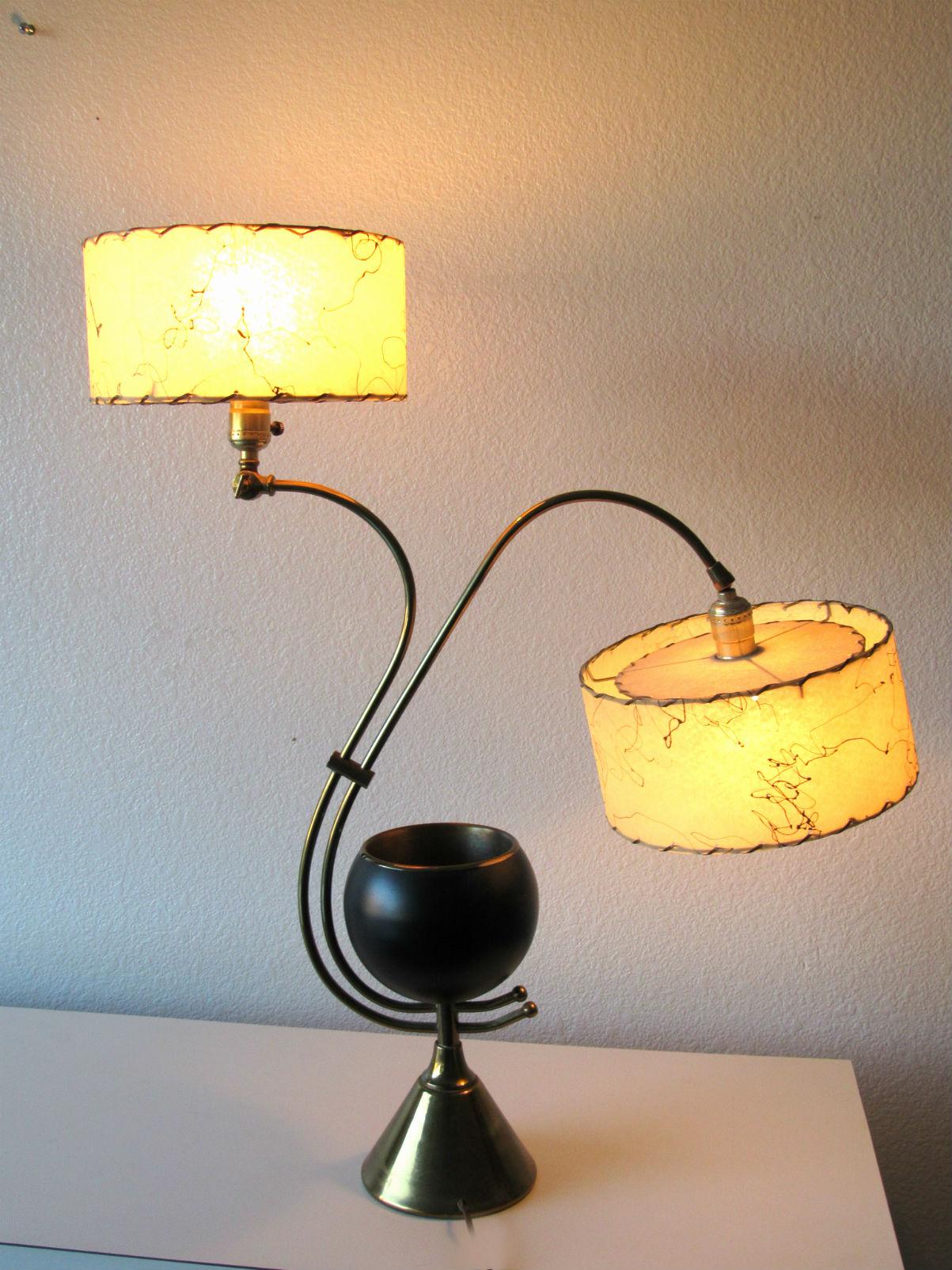 Atomic Age Majestic Adjustable Lamp with Two Original Fiberglass Shades. This wonderful lamp was lovingly cared for in one home since its purchase in the 1950s and is in remarkable condition. Made of brass with a black enameled center cup and