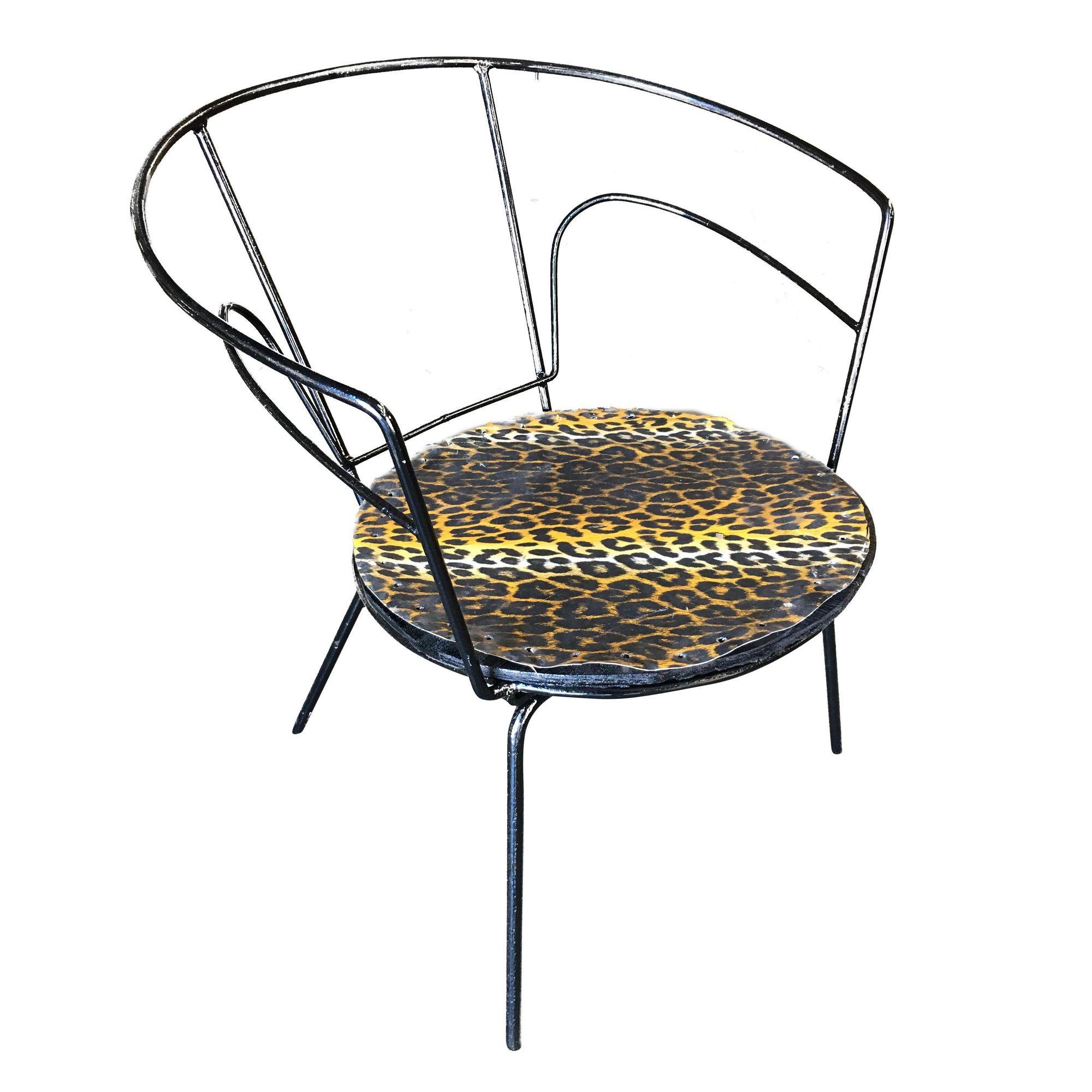 Pair of modernist Mid Century era iron wire armchairs with leopard print seat.

Circa 1950