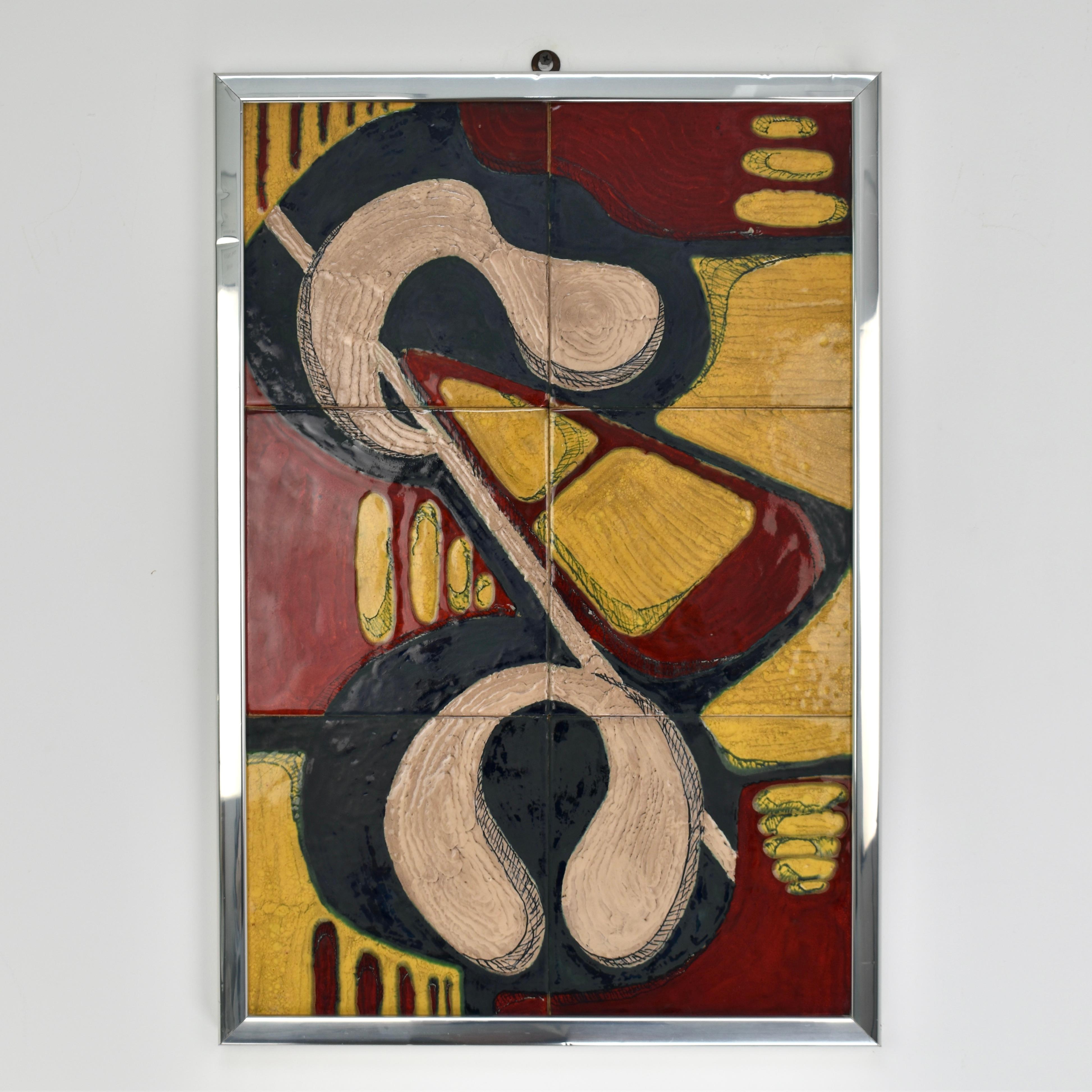 Striking Modernist Tile Tableau – Italy, circa 1970s
This rare and captivating modernist tile artwork was crafted in Italy during the 1970s. The piece features an abstract composition rendered in a variety of vibrant colors and textured finishes,