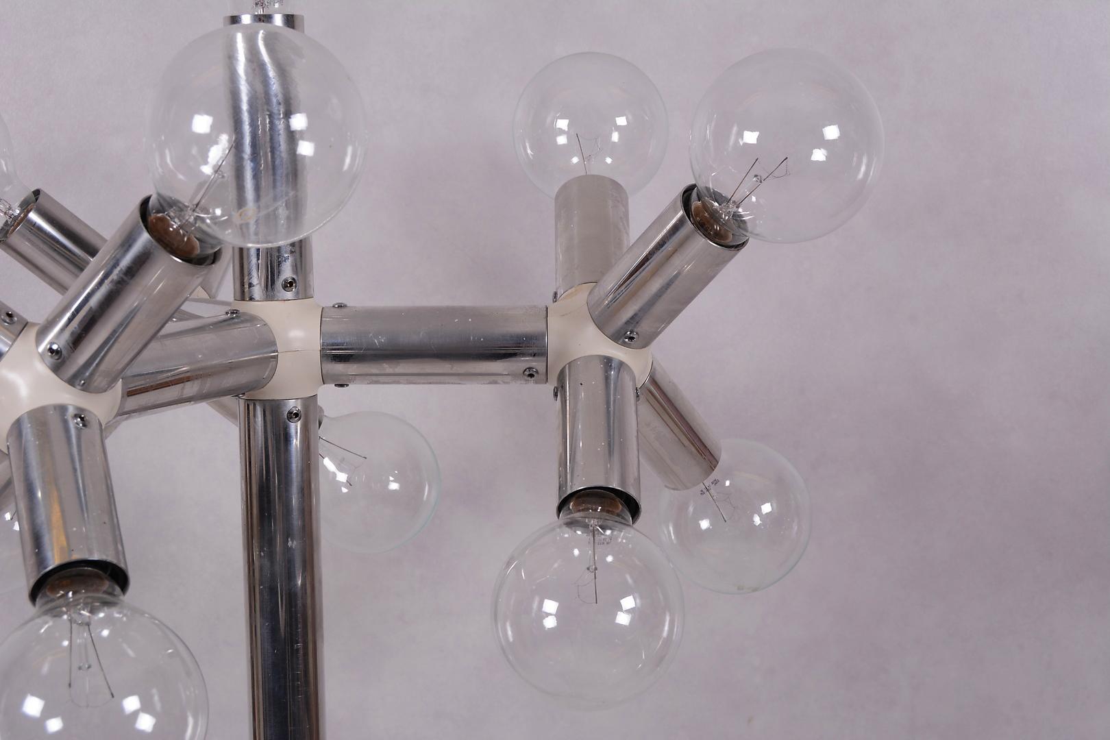 Trix and Robert Haussmann from the series C 300, produced by Swiss Lamps International in the 1960s, resembling an atomic core. Silver-colored aluminium, white plastic connections, original filament bulbs, which can also be replaced by modern