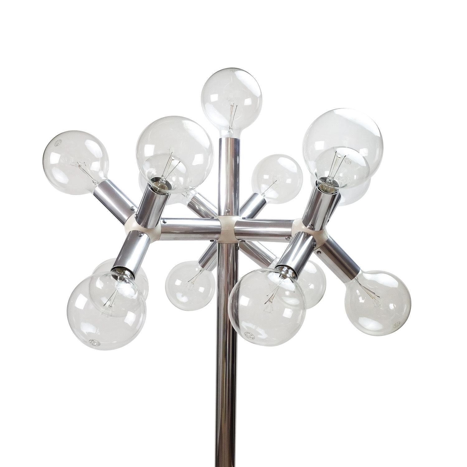 Aluminum “Atomic” floorlamp designed by Trix and Robert Haussmann in the 1960s, and produced by Swisslamps International.

The lamp is made of aluminum and connecting plastic tubes, and features 14 125mm globe lightbulbs (included).

Overall in