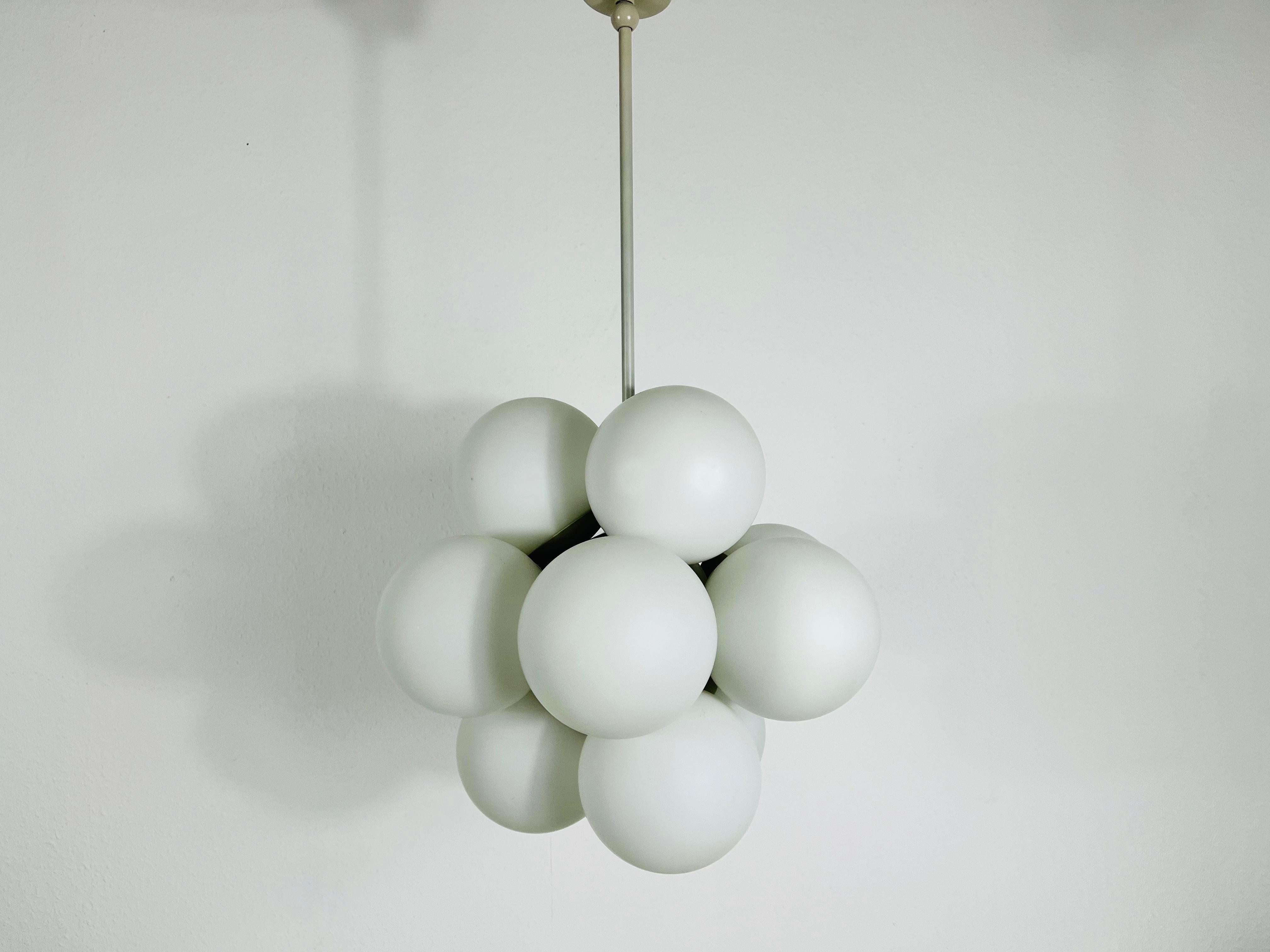 Mid-Century Modern Atomic Kaiser Midcentury White 12- Arm Space Age Chandelier, 1960s, Germany For Sale
