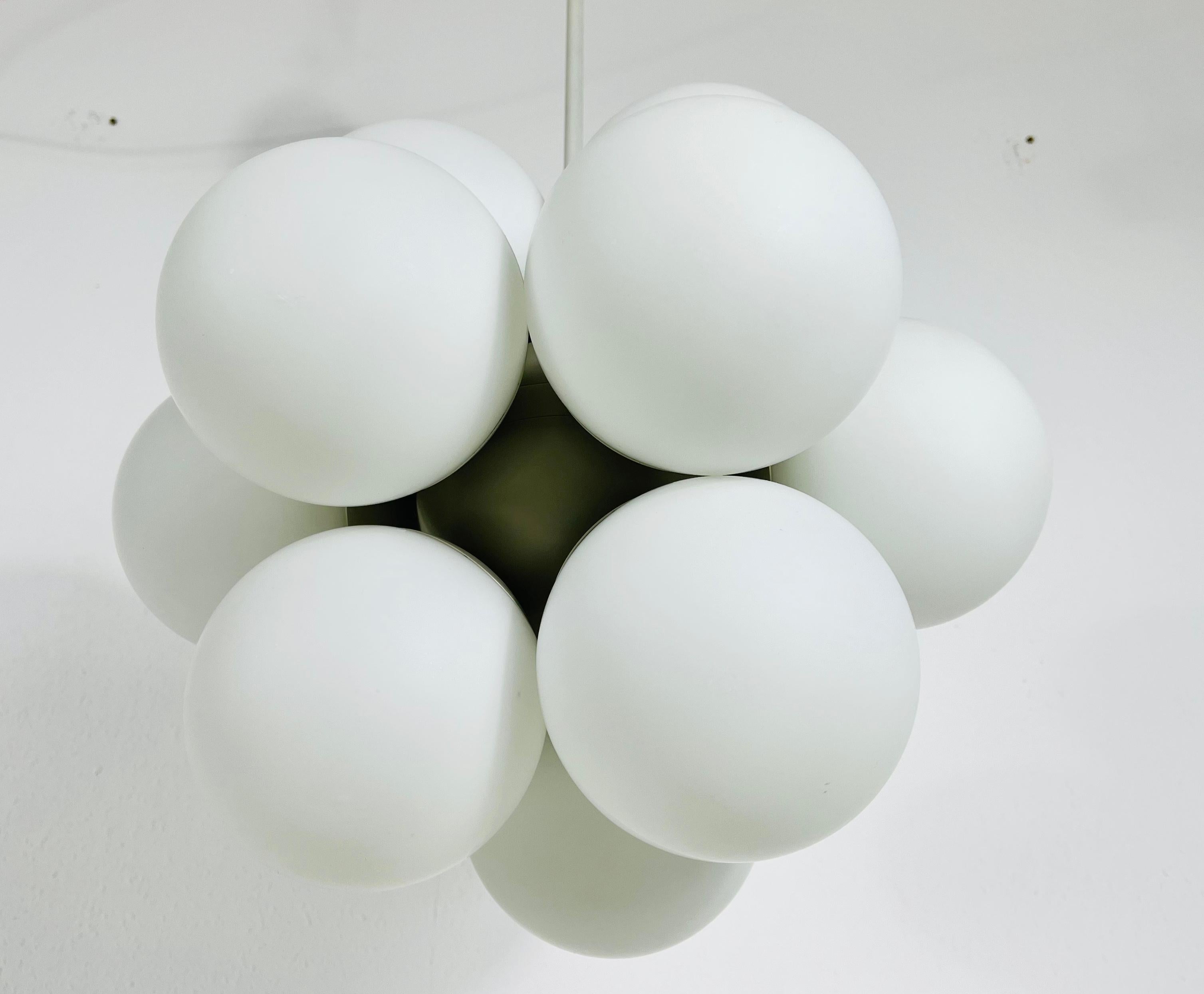 Mid-20th Century Atomic Kaiser Midcentury White 12- Arm Space Age Chandelier, 1960s, Germany For Sale