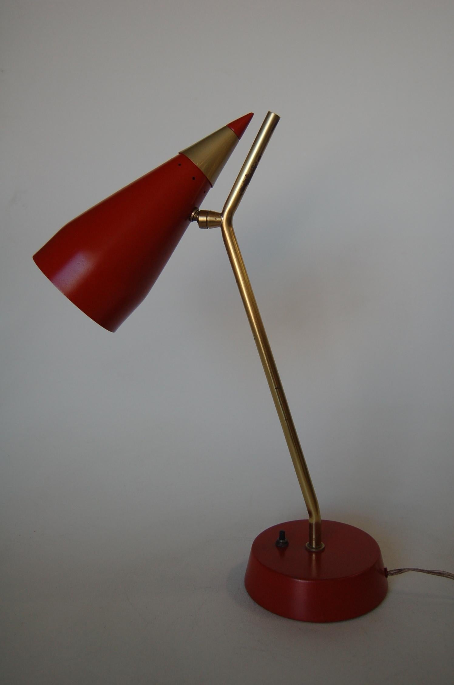 Red and gold atomic bullet metal desk table lamp. 

Measures 6