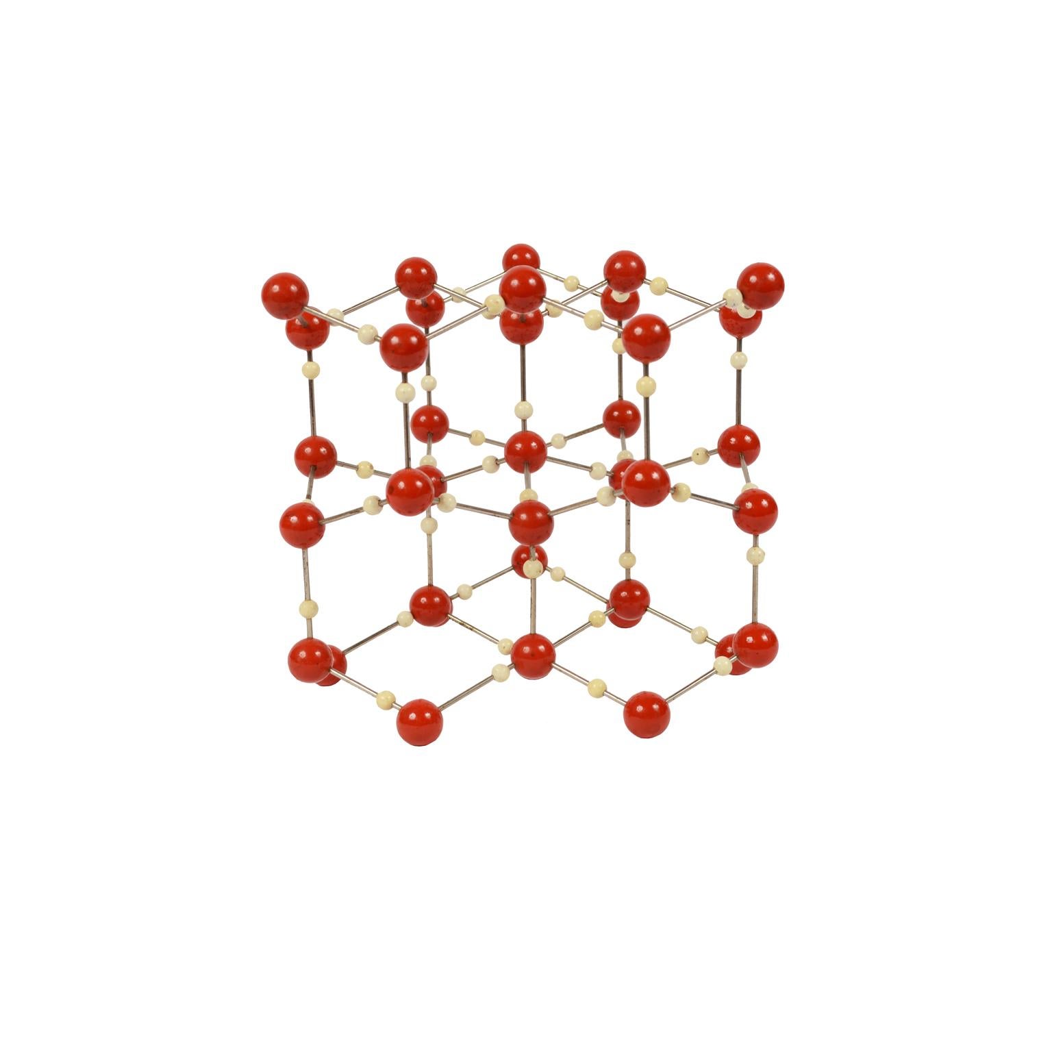 Molecular structure of water (H2O) for educational use, metal with wooden small spheres white painted, and with the larger spheres made of red painted Bakelite. Czechoslovak manufacture of the fifties. Very good condition. Measures: cm 21 x 21 x 21,