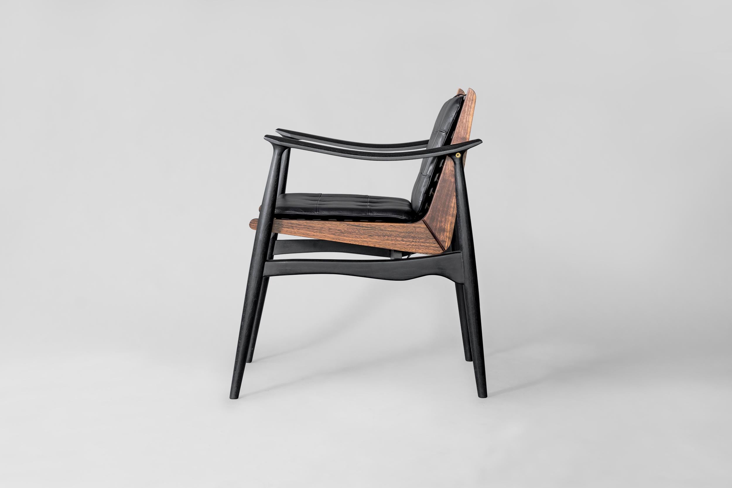 The younger brother of the popular ATRA chair. 
* Handcrafted with traditional joinery techniques. 
* Frame made of solid wood in walnut, mahogany, beech, or maple 
* Finishes available in natural oil, dark oil, black char, or black semi gloss
* The