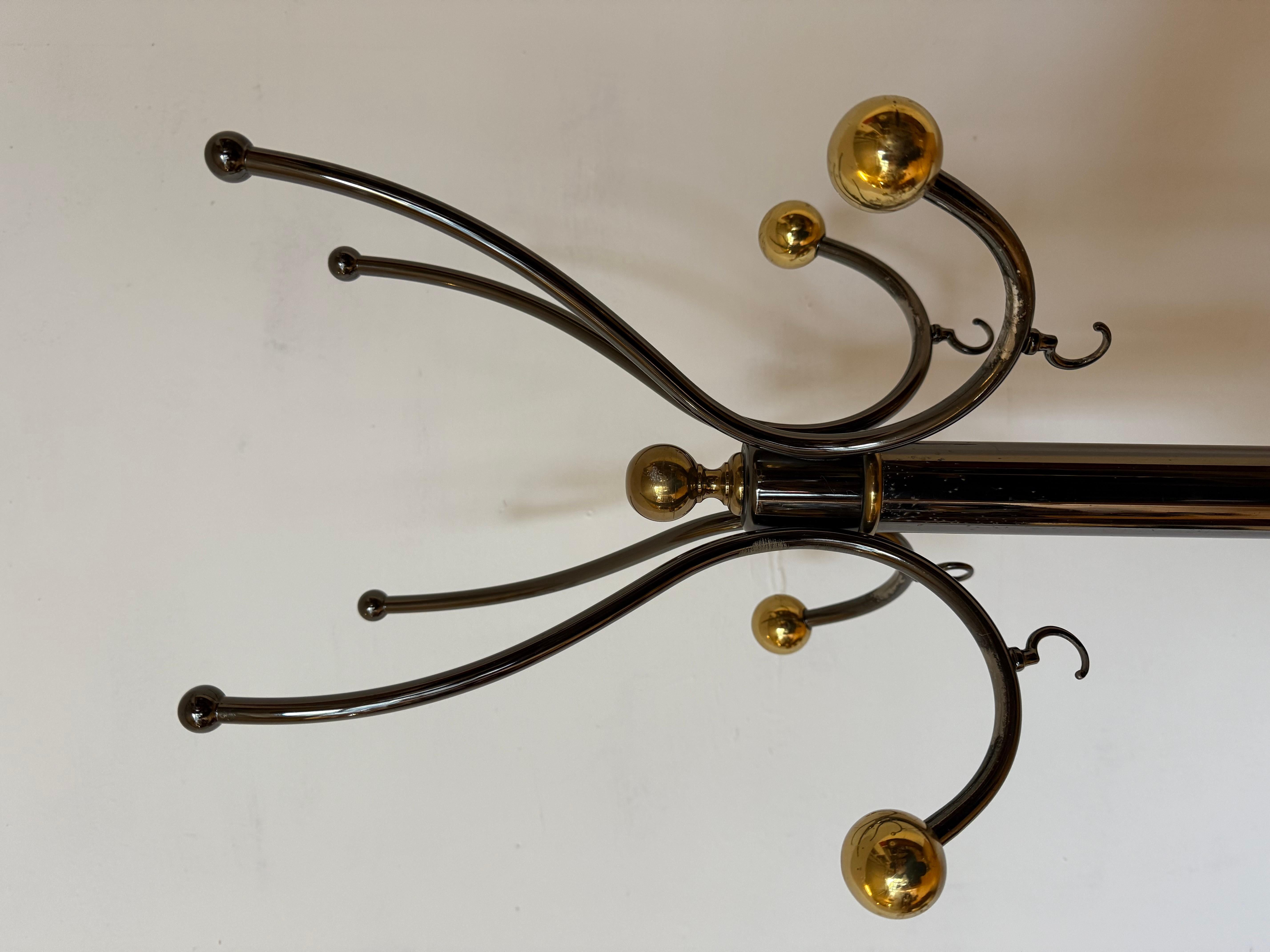 Bronze Attaccapani, isolated work with ball points Italian production XX For Sale
