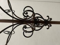 Wrought iron coat rack with umbrella holder antiqui