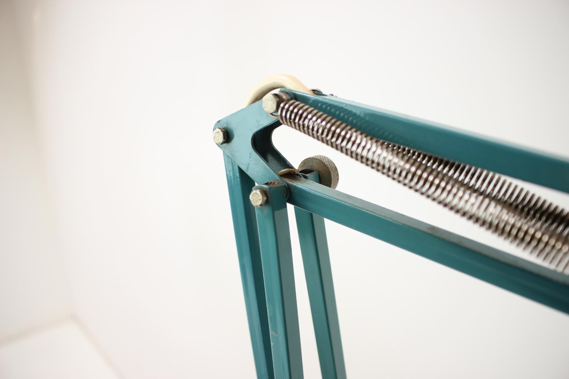 Attachable, adjustable table lamp made by Napako, in Czechoslovakia, in the 1960's.
Made of metal.
In original condition, with some signs of use (such as scratches and bending on the lampshade), repolished, cleaned.
Fully functional.