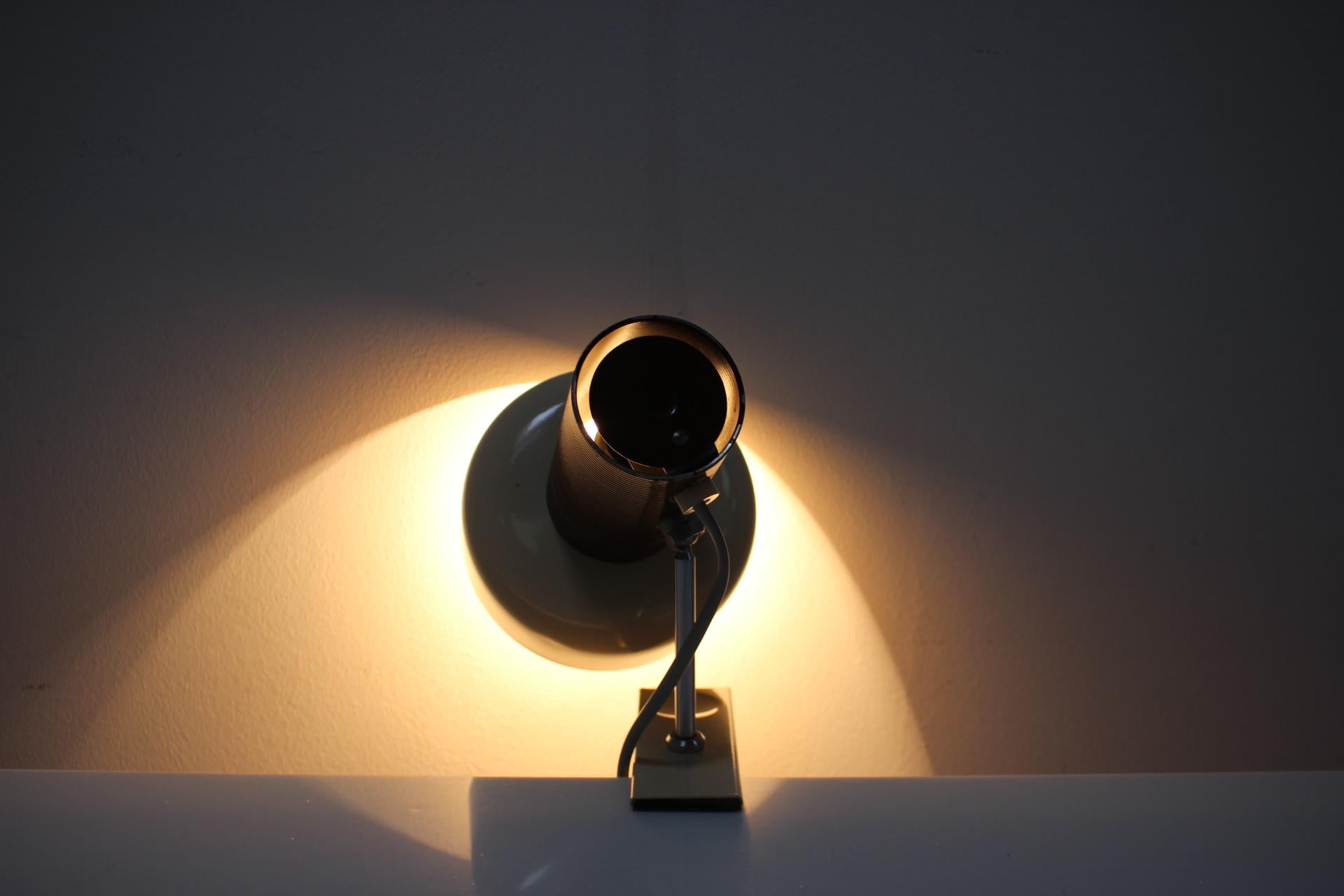 Attachable table lamp, Made by J. Hurka, manufactured by Napako, Czechoslovakia 1960's.
Made of metal and chrome.
Shows signs of use and age, fully functional, ready to be plugged in.
Repolished, cleaned.

