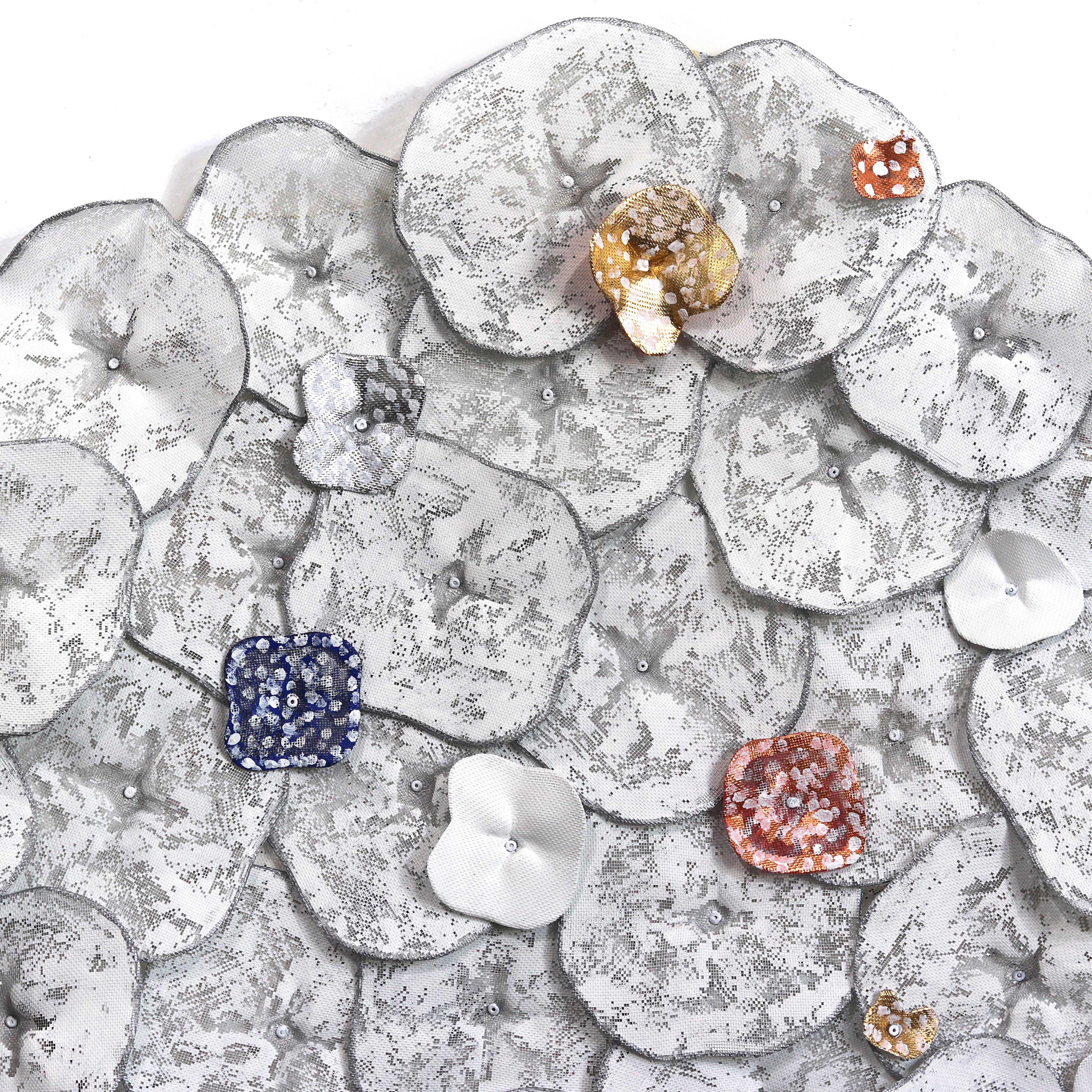 Atticus Adams' organically composed modern metal sculptures embody the transformative power of art, illustrating the creation of beauty, meaning, and emotional impact from industrial materials. Using mostly aluminum mesh—generally found in screen