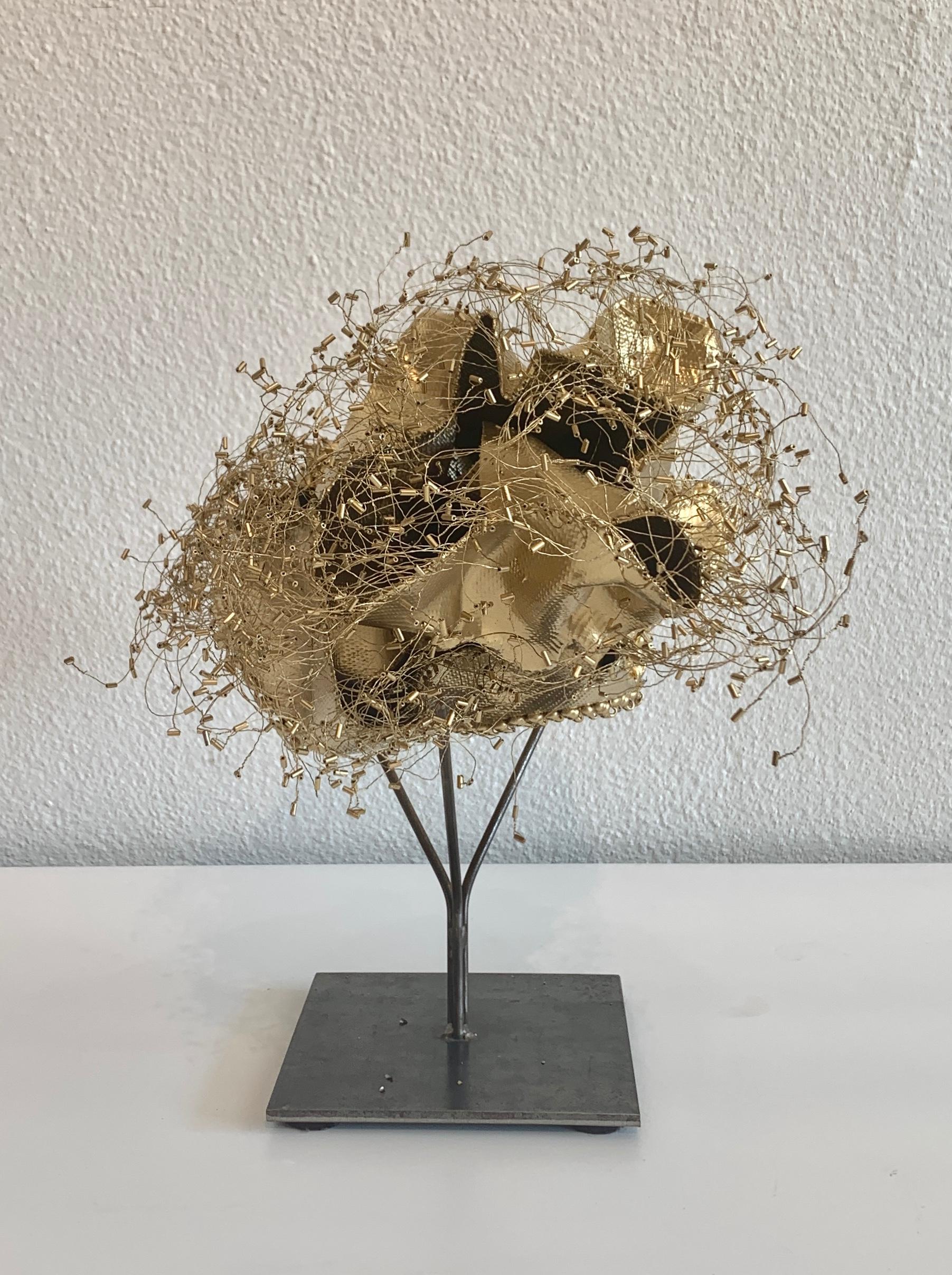 gold metal sculpture