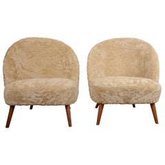 Attributed Arne Norell, a Pair of Asymmetrical Lounge Chairs