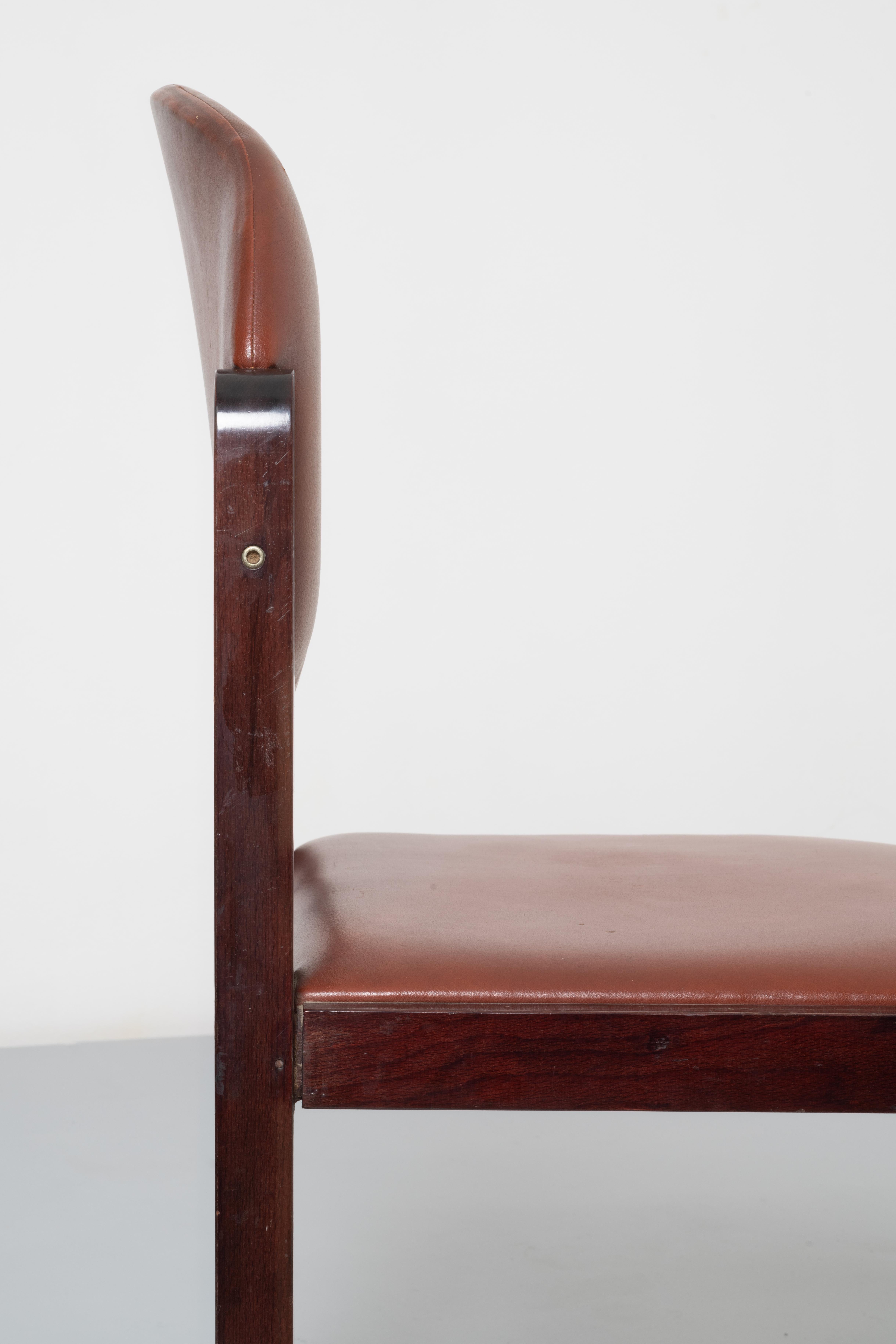 Italian Attr. Augusto Savini Six faux leather armchairs.