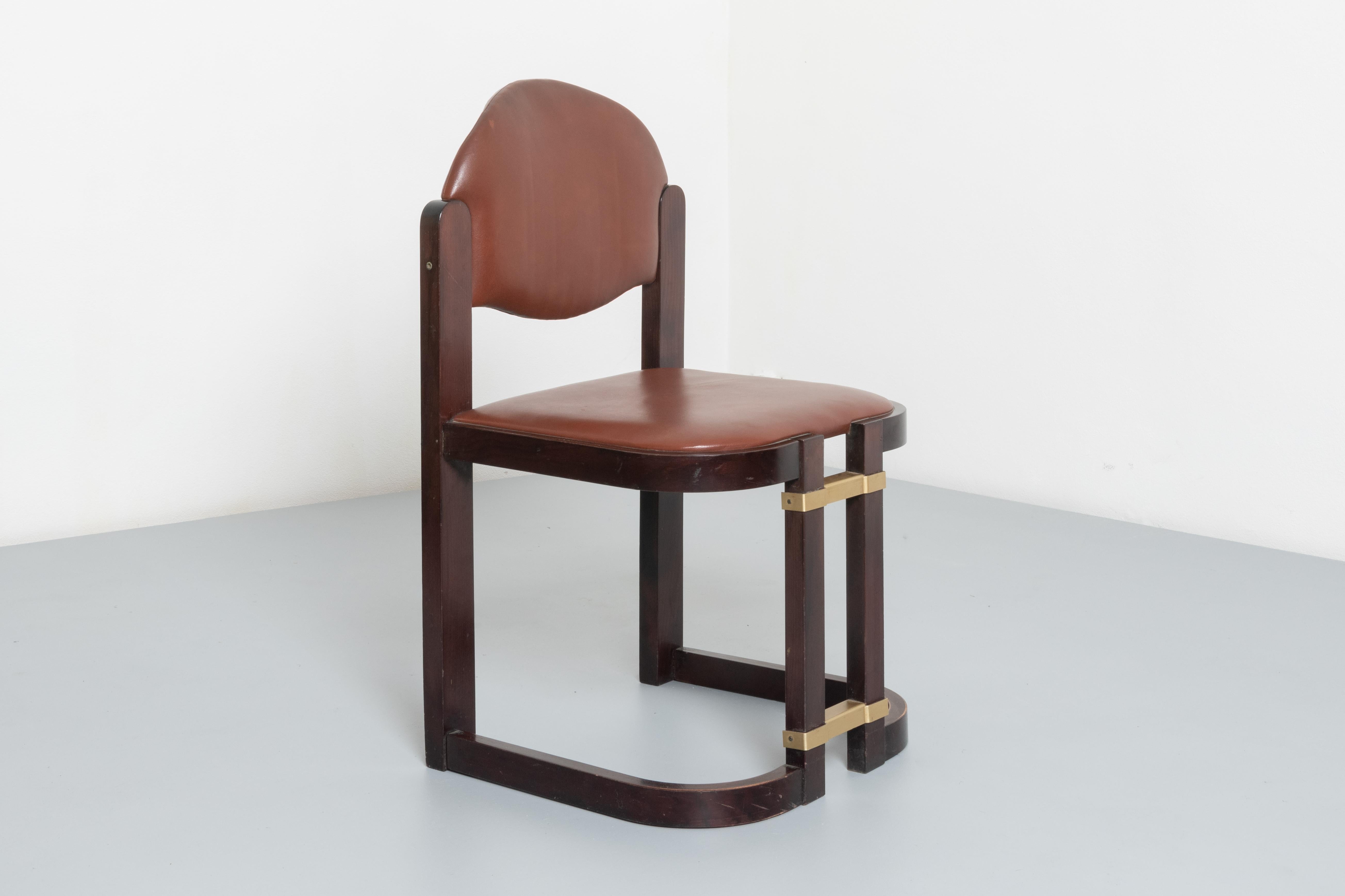 Brass Attr. Augusto Savini Six faux leather armchairs.