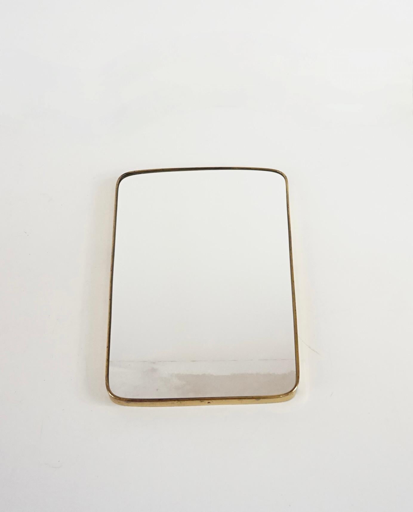 Italian attr. Gio Ponti by Fontana Arte brass wall mirror, Hotel Bristol, 1950 For Sale
