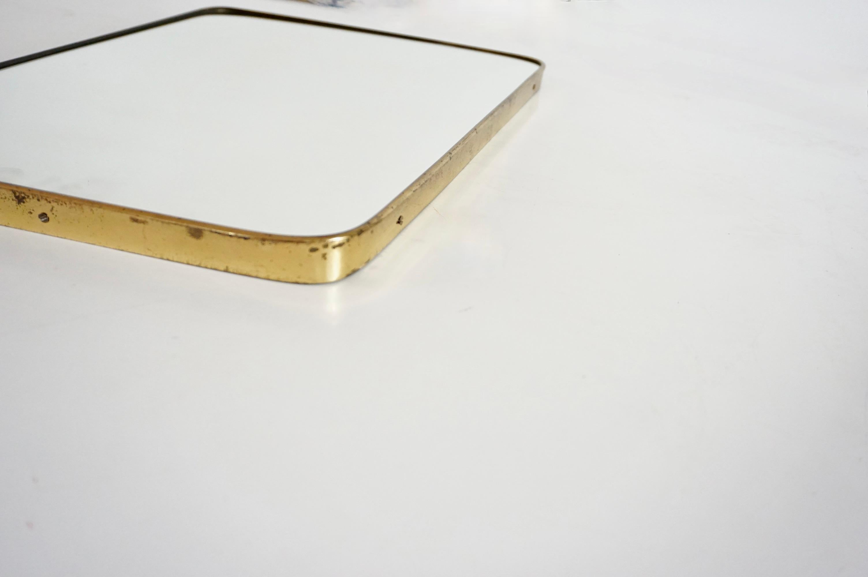 Mid-20th Century attr. Gio Ponti by Fontana Arte brass wall mirror, Hotel Bristol, 1950 For Sale