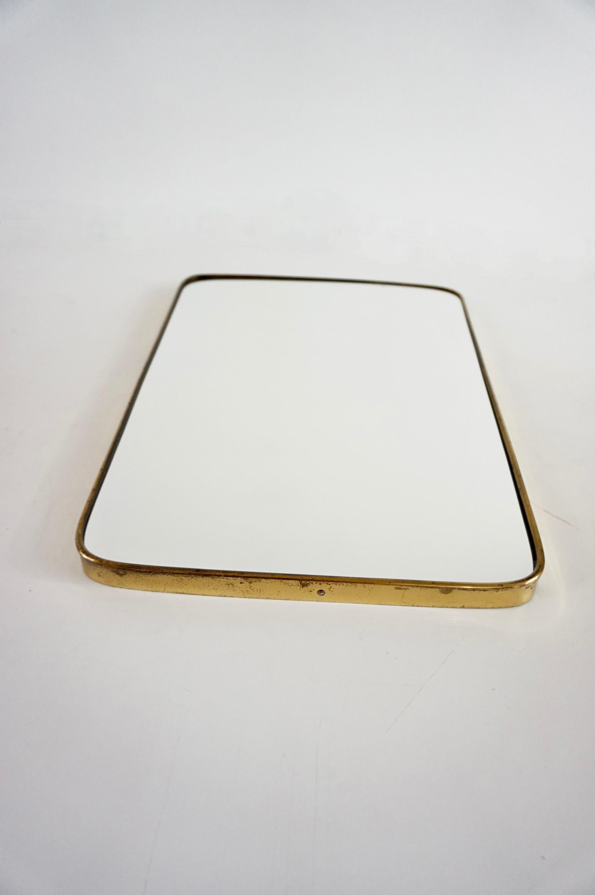 Brass attr. Gio Ponti by Fontana Arte brass wall mirror, Hotel Bristol, 1950 For Sale