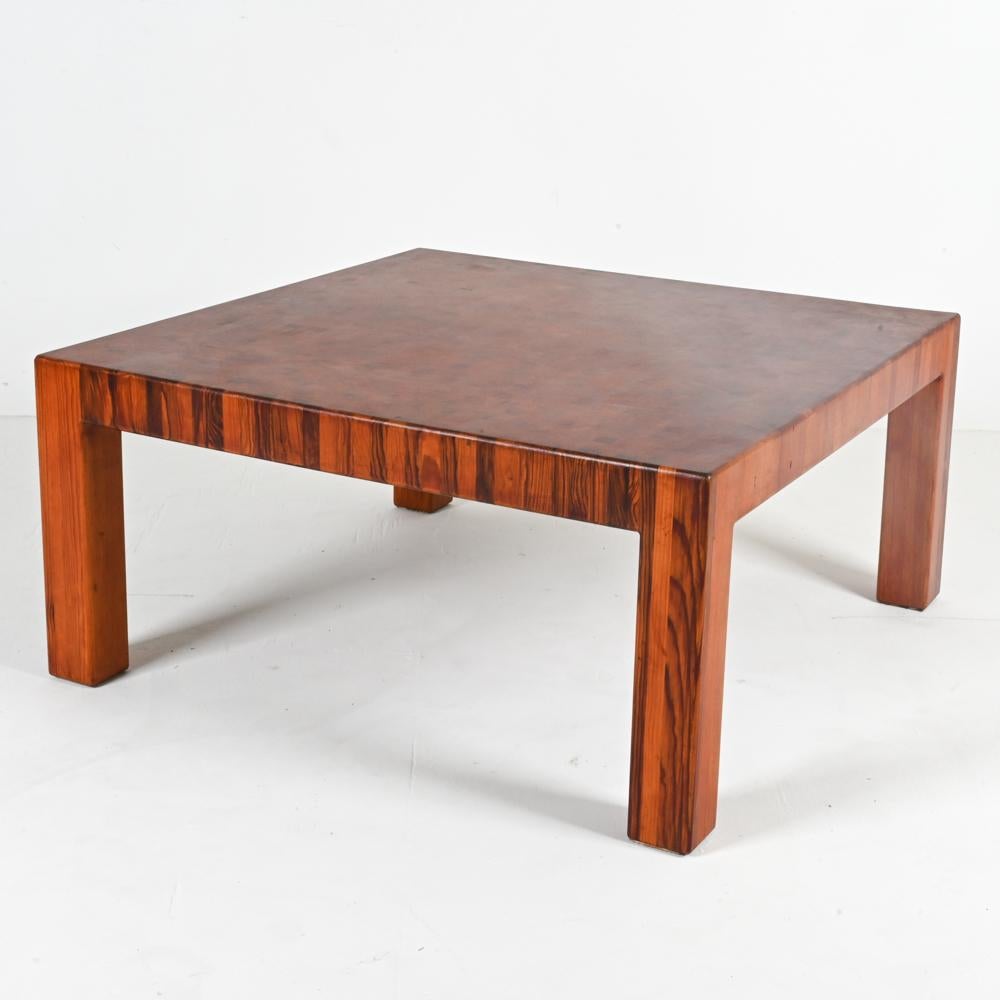 Searching for a stunning statement piece to elevate and energize your sitting room? Look no further than this captivating Parsons-style cocktail table attributed to Rolf Middelboe for Tranekær Furniture.  

The table's top is a thick butcher-style