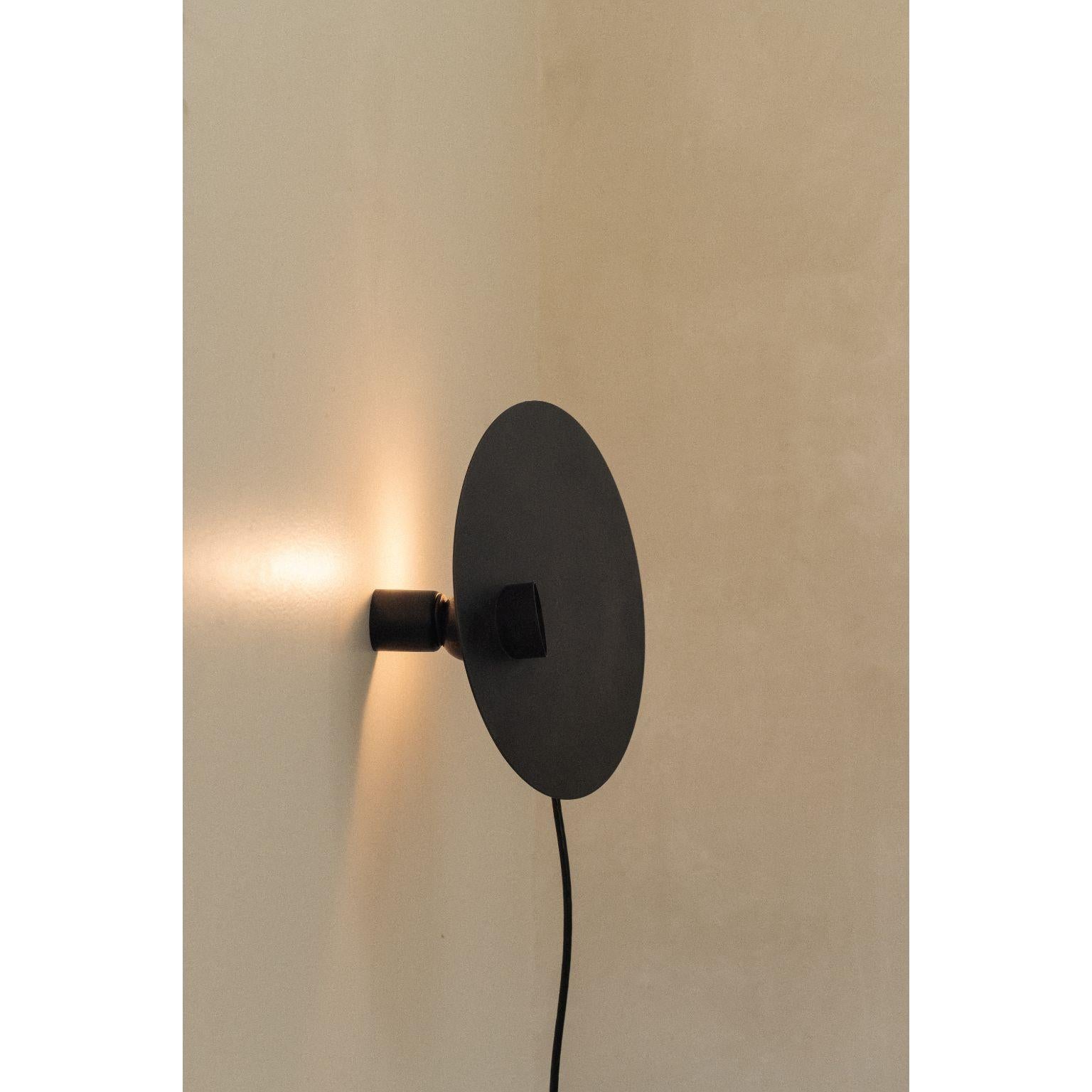 Attraction Sconce by Nick Pourfard
Dimensions: Ø 28 x H 8 cm.
Materials: metal, magnets.
Different finishes available. Please contact us.

All our lamps can be wired according to each country. If sold to the USA it will be wired for the USA for