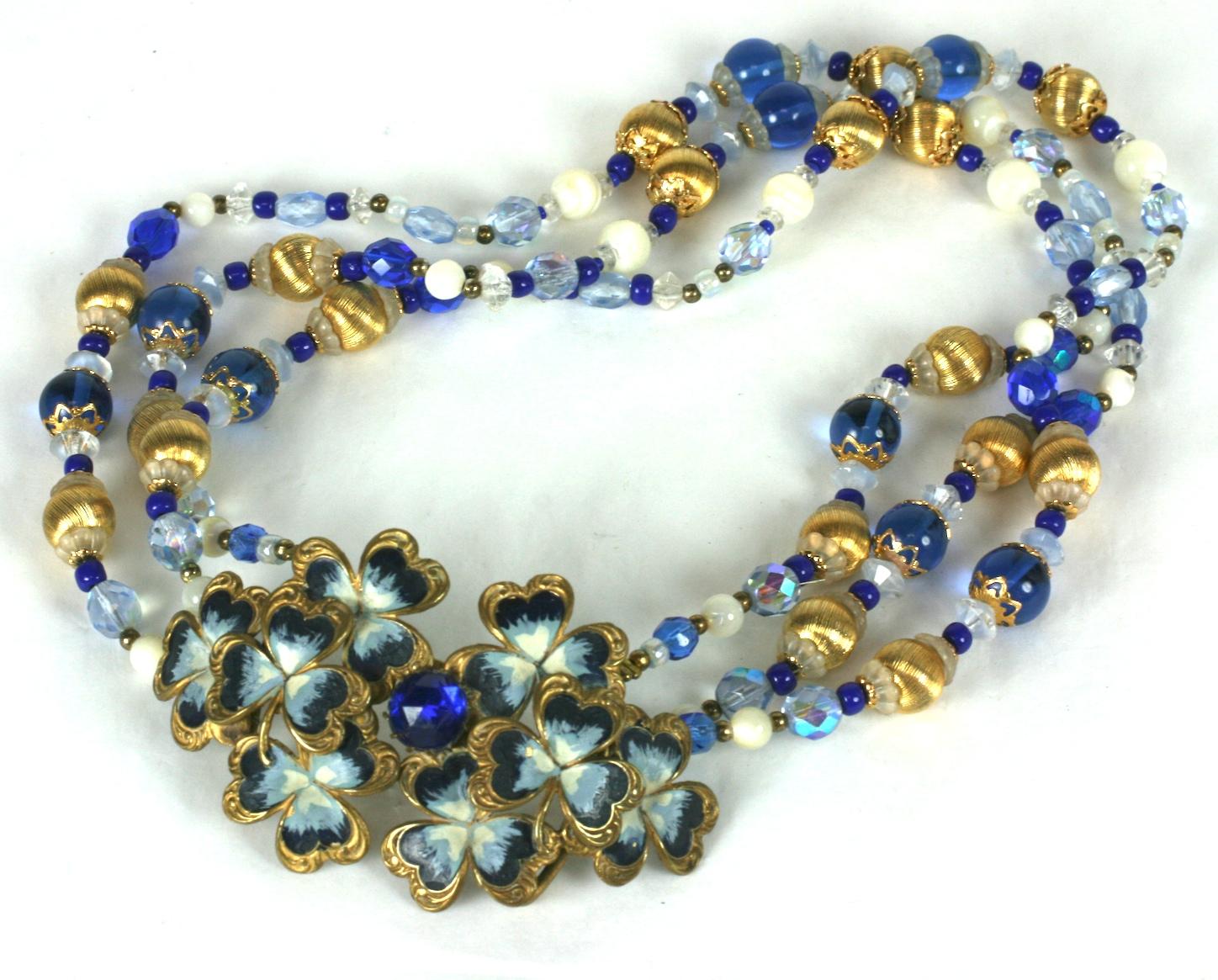 Attractive Upcycled Bead Necklace with Victorian Enamel Buckle. Artisan manufactured with a Victorian enameled clover motif buckle with sapphire paste, married to more contemporary and matching gilt, crystal, aurora, jet and sapphire glass beads.