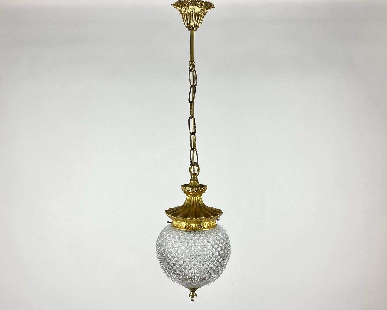 Vintage textured glass and gilded brass ceiling chandelier or lantern. 

 Beautifully detailed, hanging lamp, lantern. 

The textured glass plafond is set in a gold-plated brass rim.

 The gilded parts are beautifully decorated and the glass