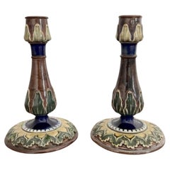 Attractive pair of Antique Royal Doulton candlesticks 