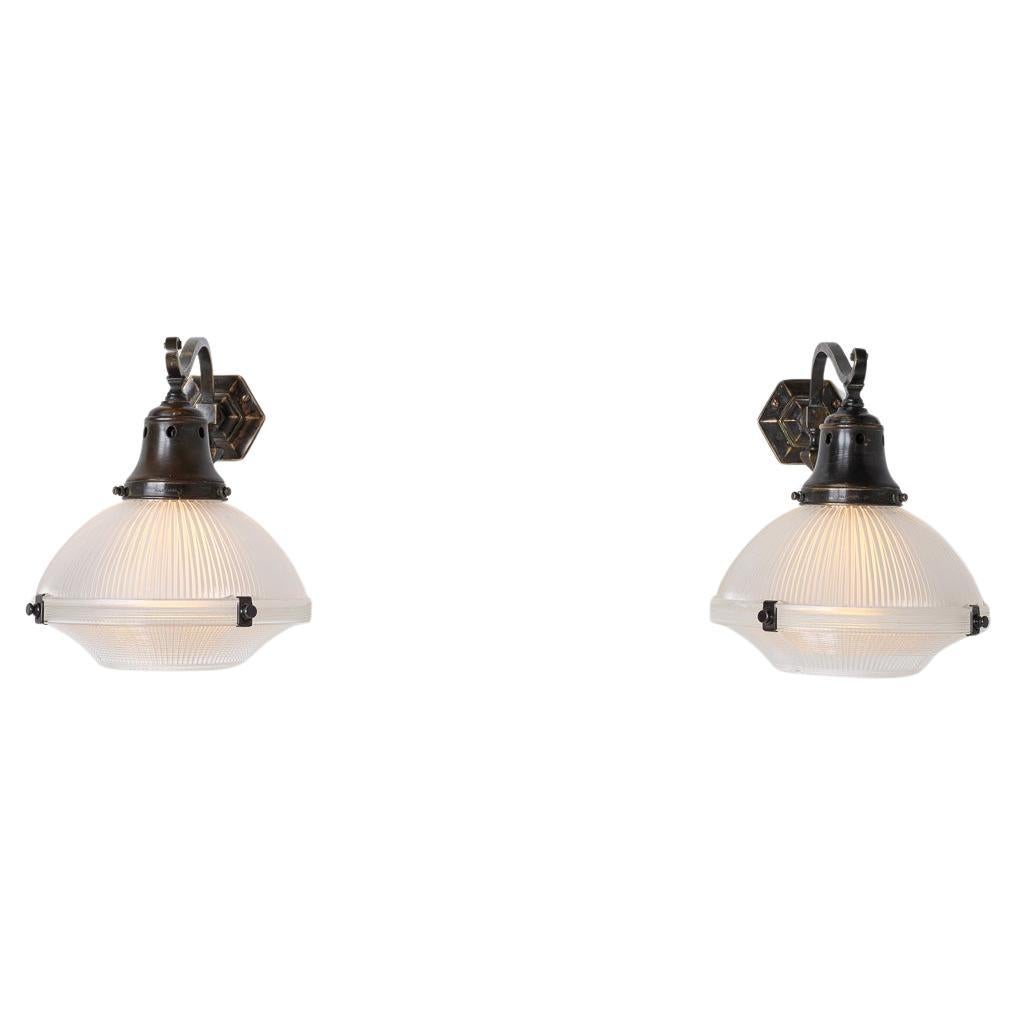 Attractive Pair of Holophane Wall Scones on Aged Brass Brackets For Sale