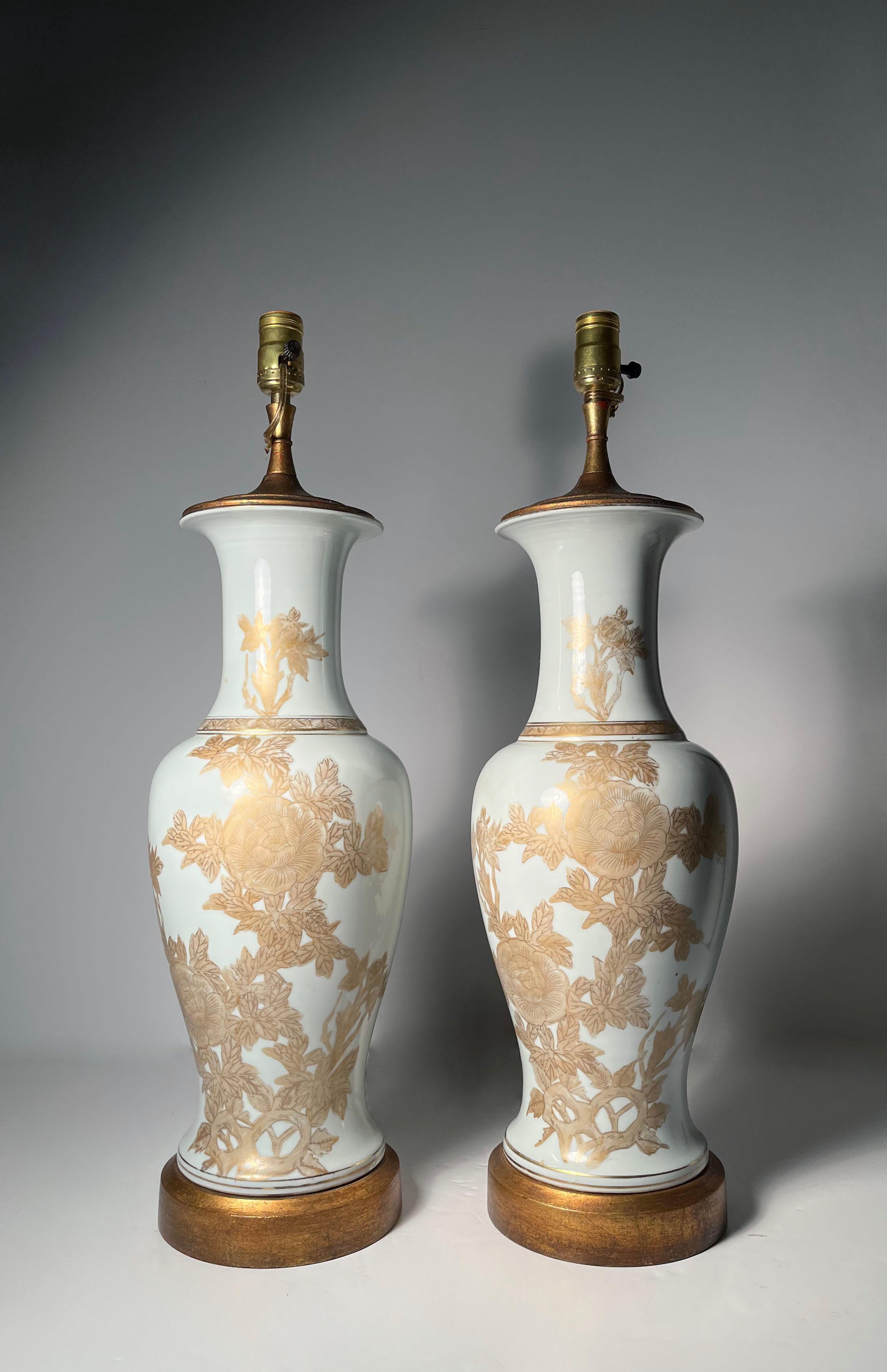 Attractive Pair of Large Japanese White & Gold Chinoiserie Floral Designer Ceramic Lamps

These come with brackets and finials (not shown).

26.25