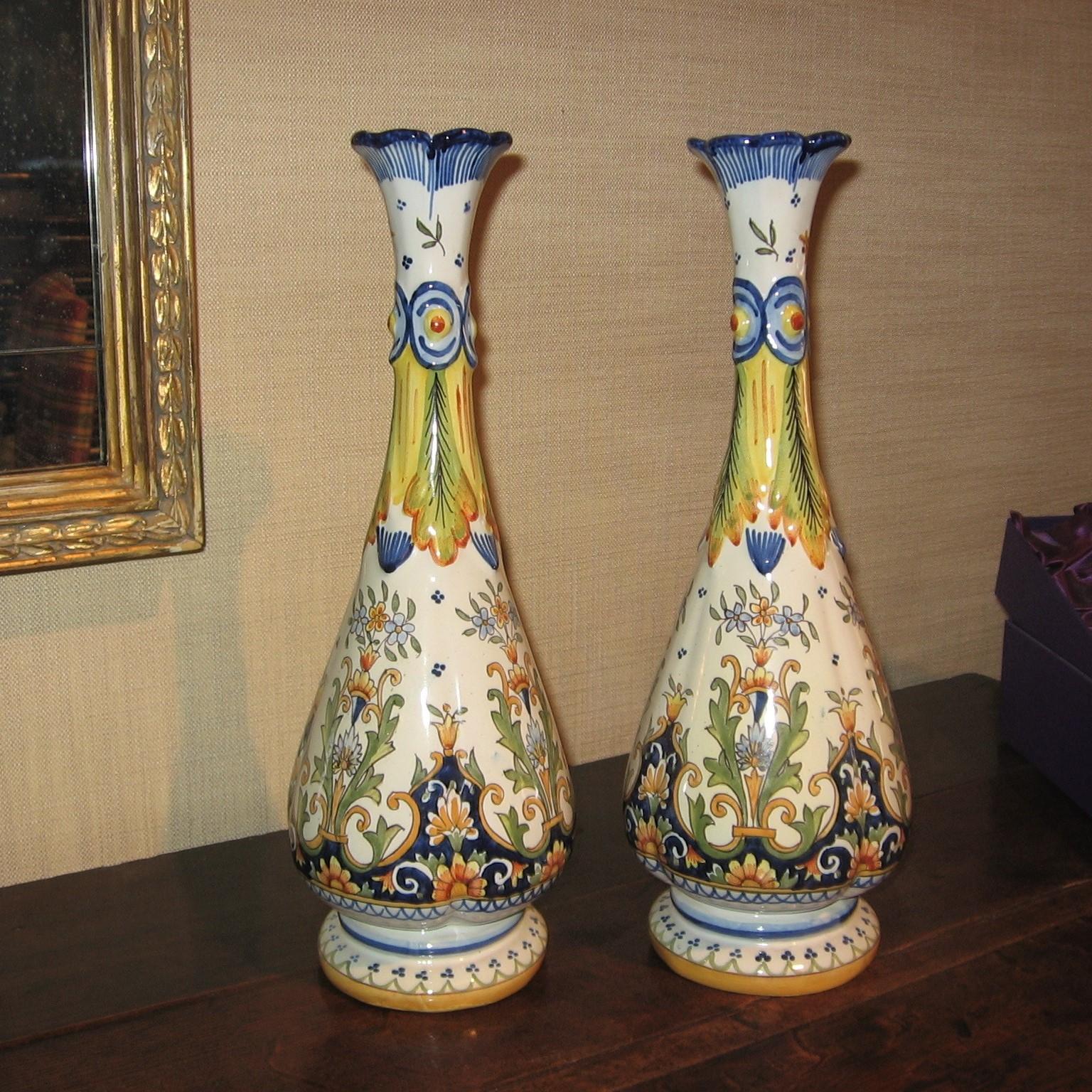 Very attractive pair of old hand painted tall faience vases from England. 
Circa 1880.
