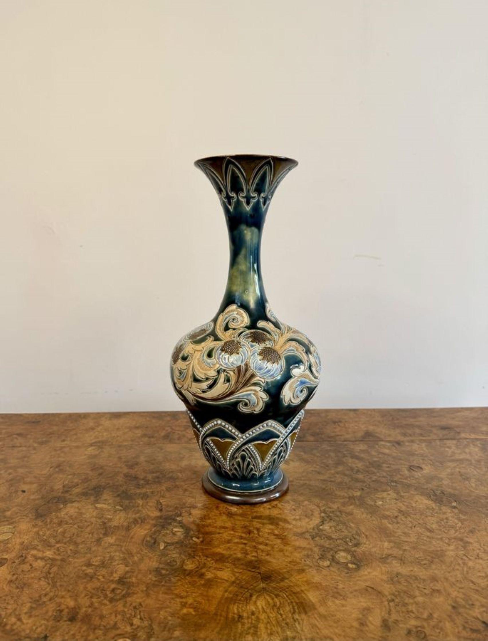 Attractive quality antique Doulton lambeth vase by Eliza Simmance, having an outstanding quality vase with a bulbous body and a fluted neck decorated with flowers, leaves and patterns in fantastic green, blue and brown colours. 
Stamped and signed