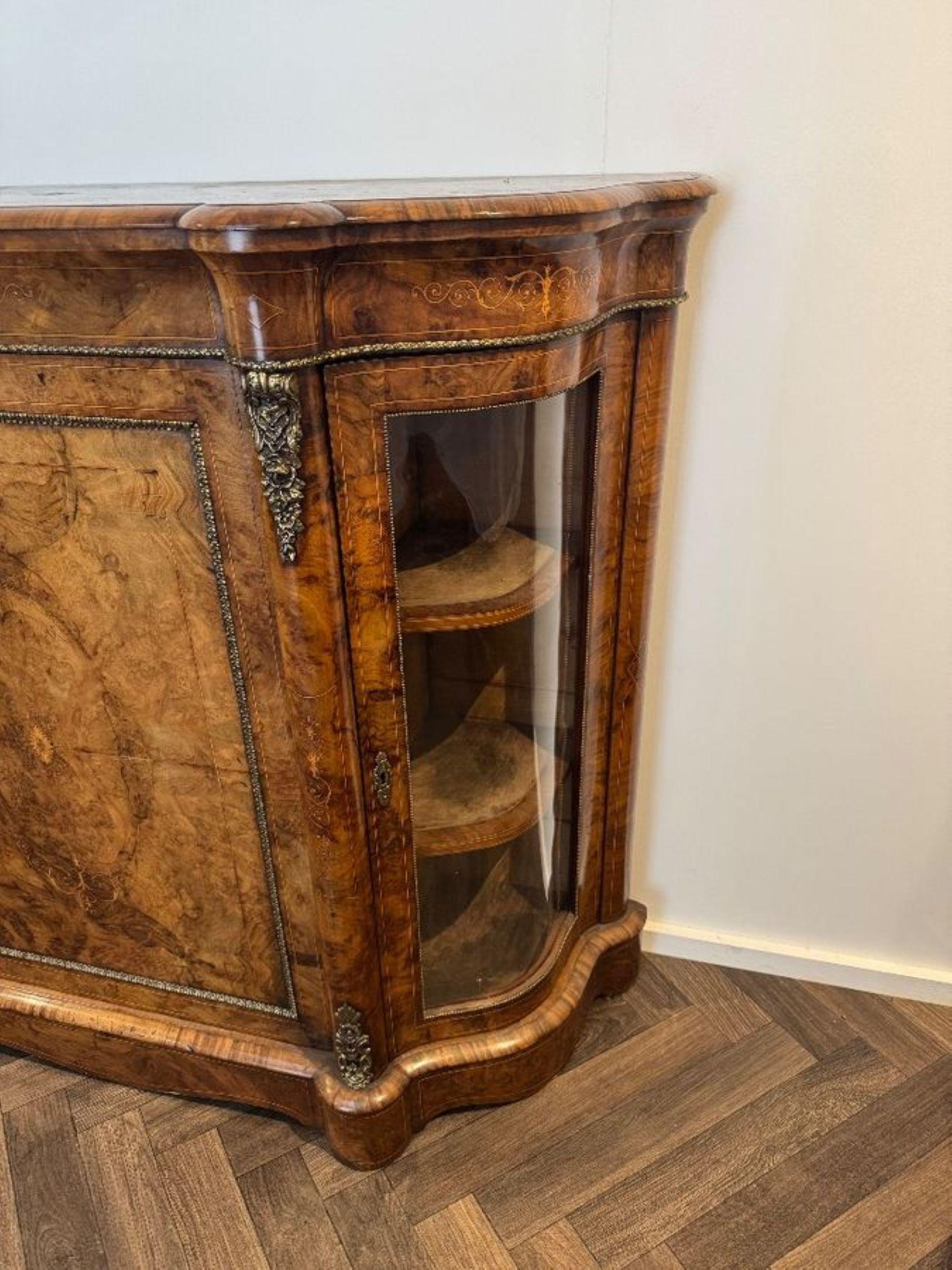 Attractive quality pair of antique Victorian burr walnut side cabinets, having an attractive pair of antique Victorian burr walnut side cabinets, with a shaped moulded top above a central door with intricate inlaid detailing bordered by decretive