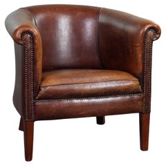 Antique Attractive sheepskin leather club chair