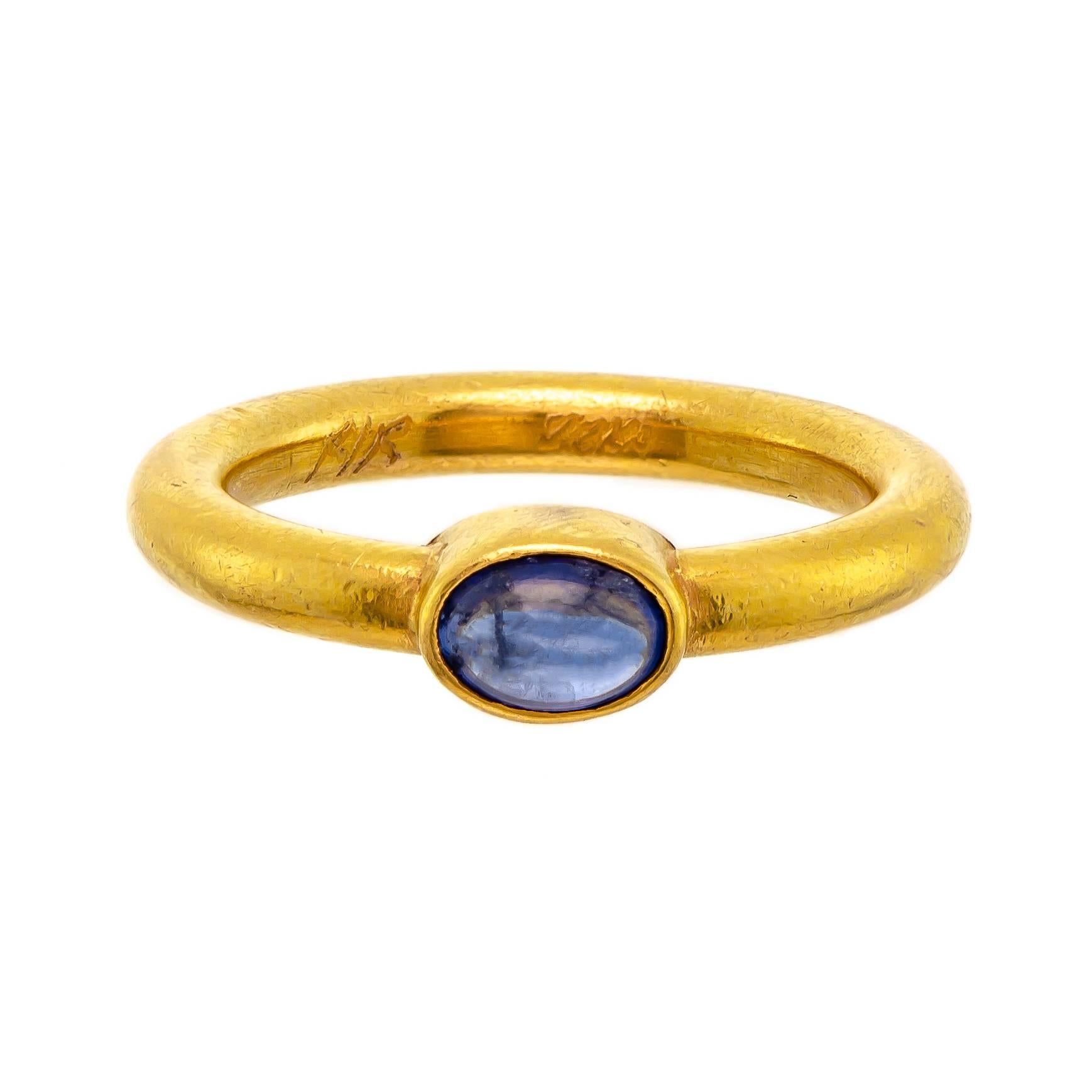 Attractive Trim and Tailored 22 Karat Sapphire Cabochon Ring For Sale