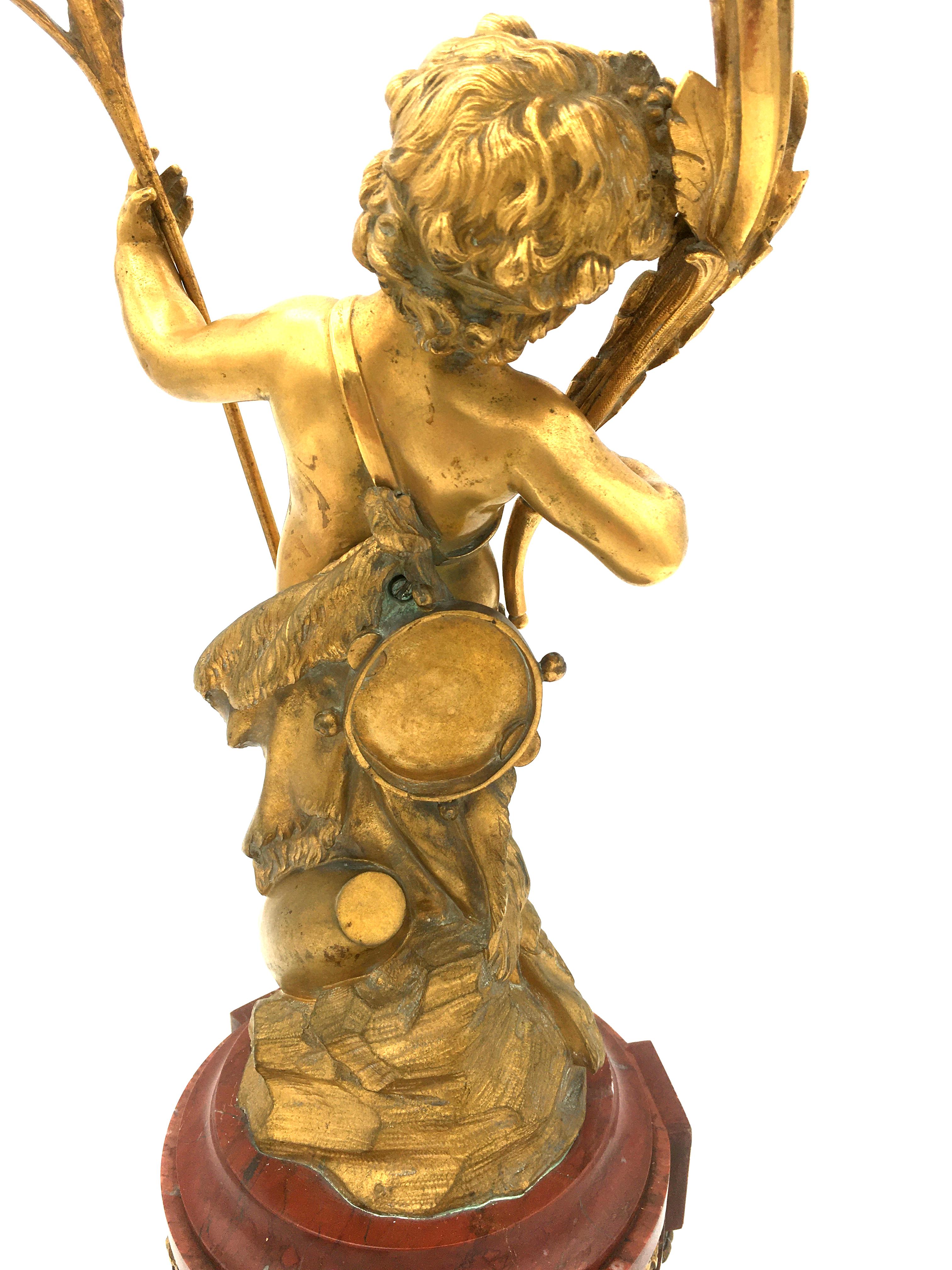 Louis XVI CLODION - Paire de candélabres en bronze doré et marbre rouge avec Putti - 19ème France en vente