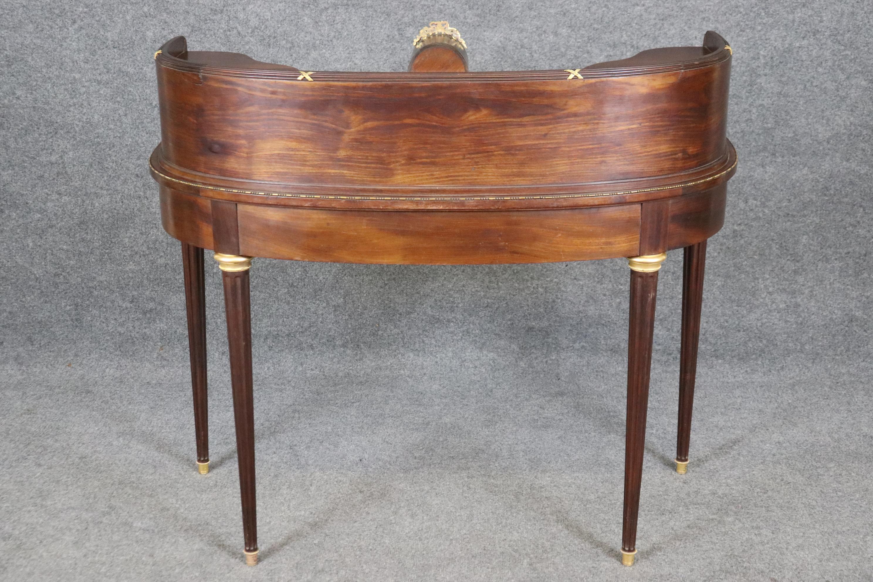 Attributed Francoise Linke French Louis XVI Leather Top Rosewood Desk with Clock In Good Condition In Swedesboro, NJ