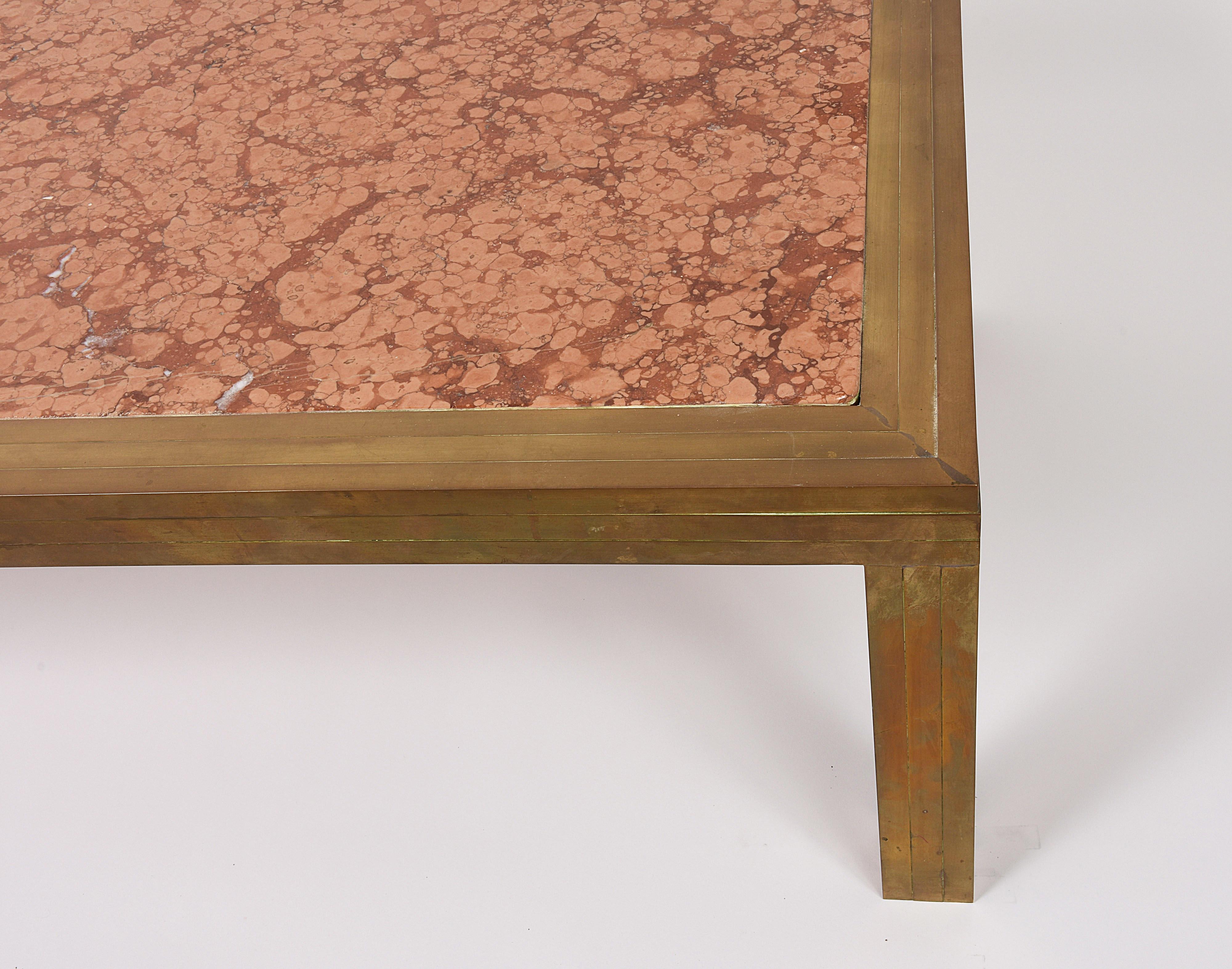 Beautiful Italian coffee table, circa 1970. The material used is Rosso Verona Marble (Italy) and brass.