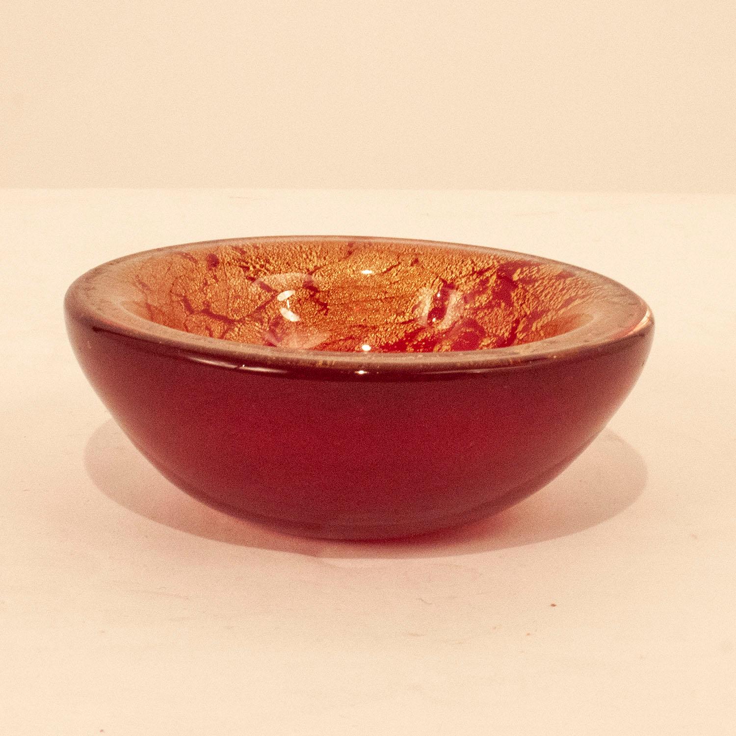 Attributed to Archimede Seguso gold fleck glass bowl , mid-20th century. Italy. Maroon and gold color.
Very good condition and nice colour.
The greatest master glass maker of the XX century, from his creative genius wonderful glass artworks, also