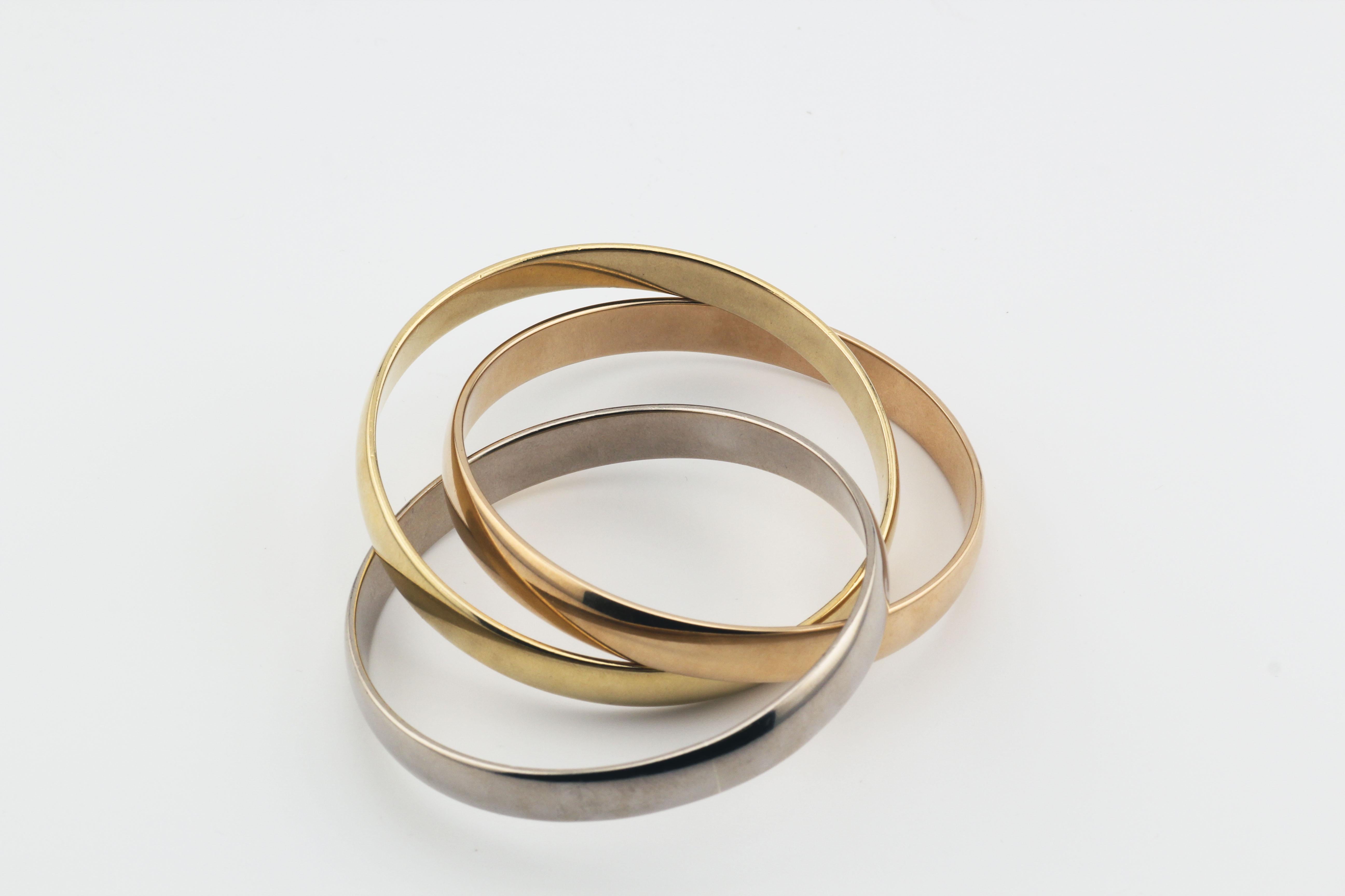 Cartier Trinity 18K Tri-Color Gold Armreif Armband zugeschrieben für Damen oder Herren